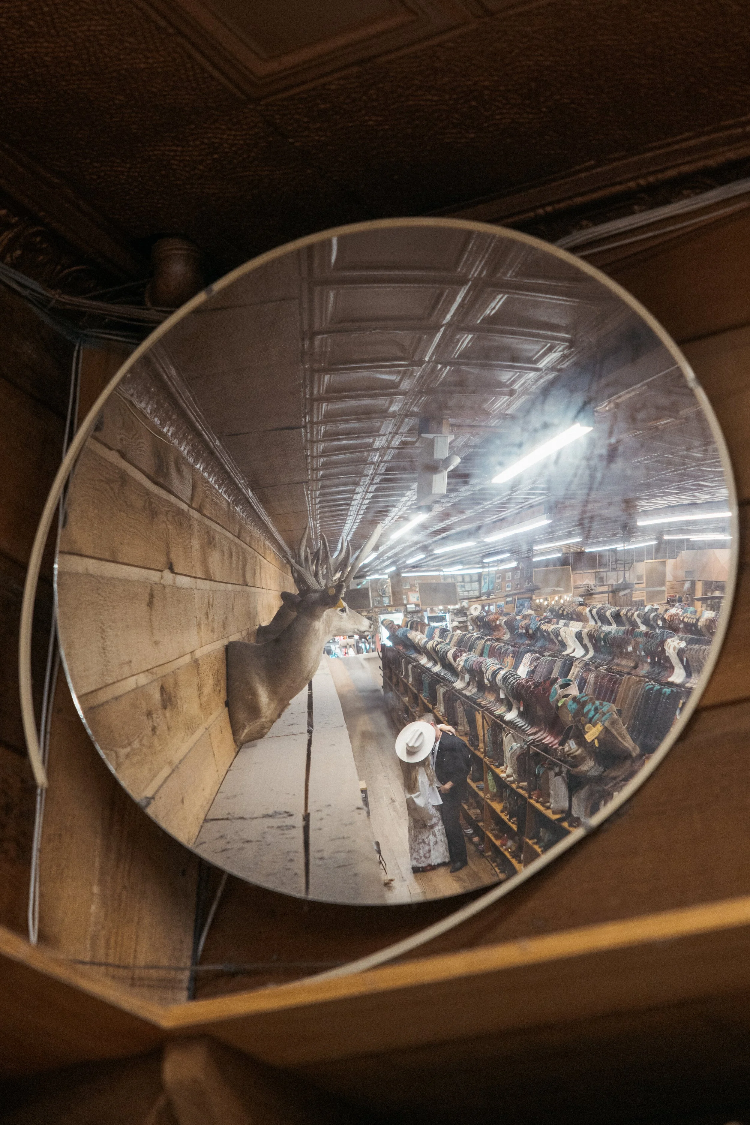 Western high fashion engagement session on South Congress, Austin Texas — Allen's Boots, Tecovas, editorial film photography by Lauren Nicole Photo