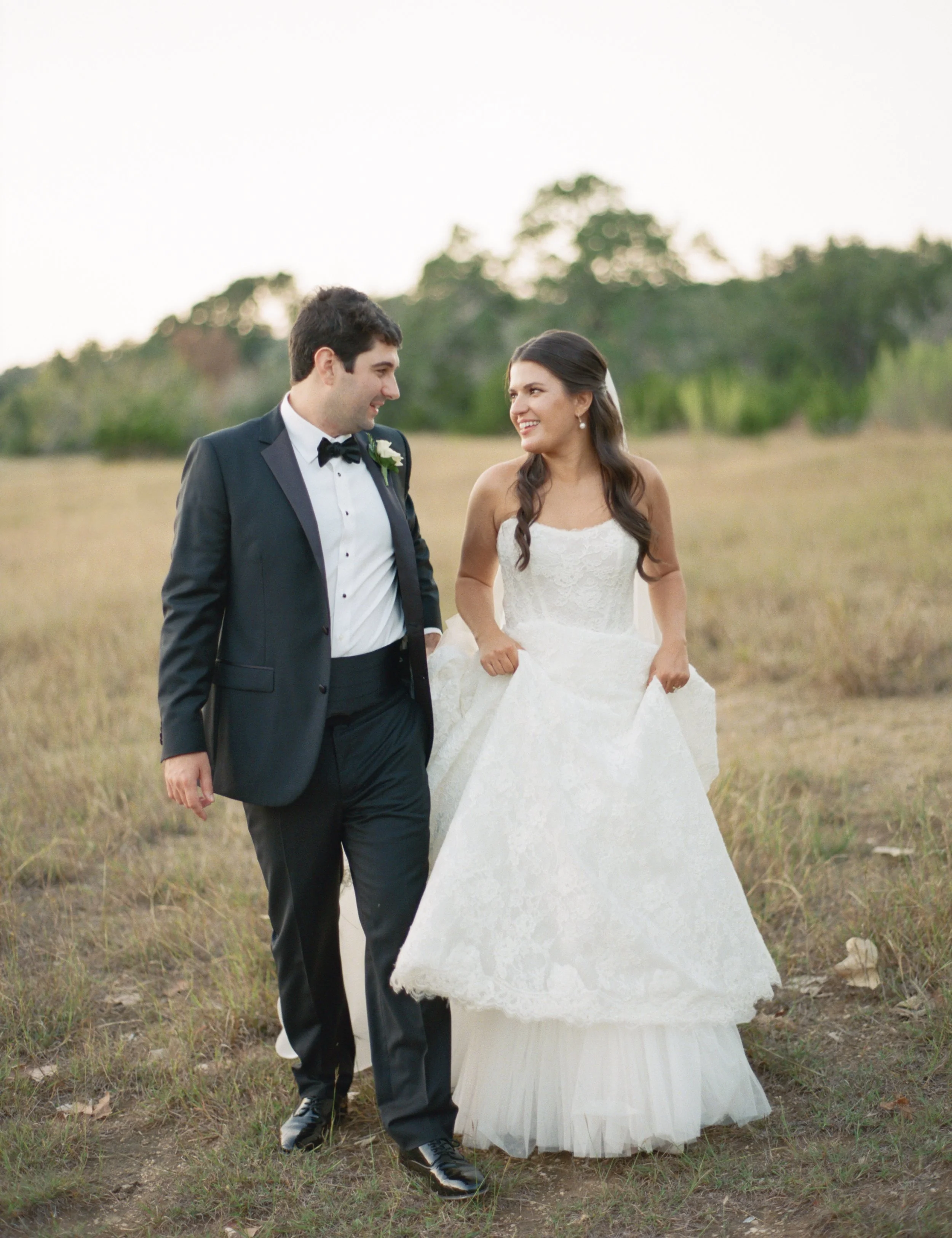 Old money floral wedding reception at Camp Lucy Sacred Oaks — candid documentary dance floor photography by Lauren Nicole Photo
