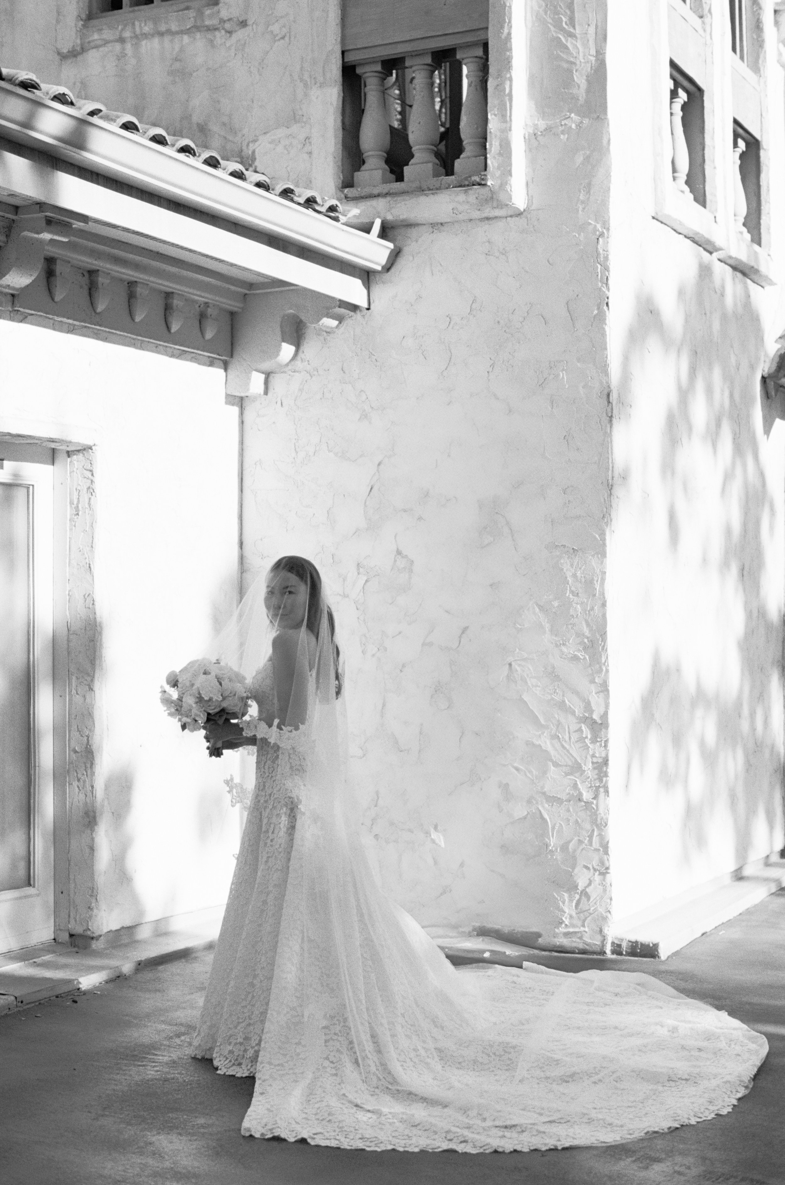 Bride in Lee Petra Grebenau gown at Villa Antonia Austin — editorial documentary wedding photography by Lauren Nicole