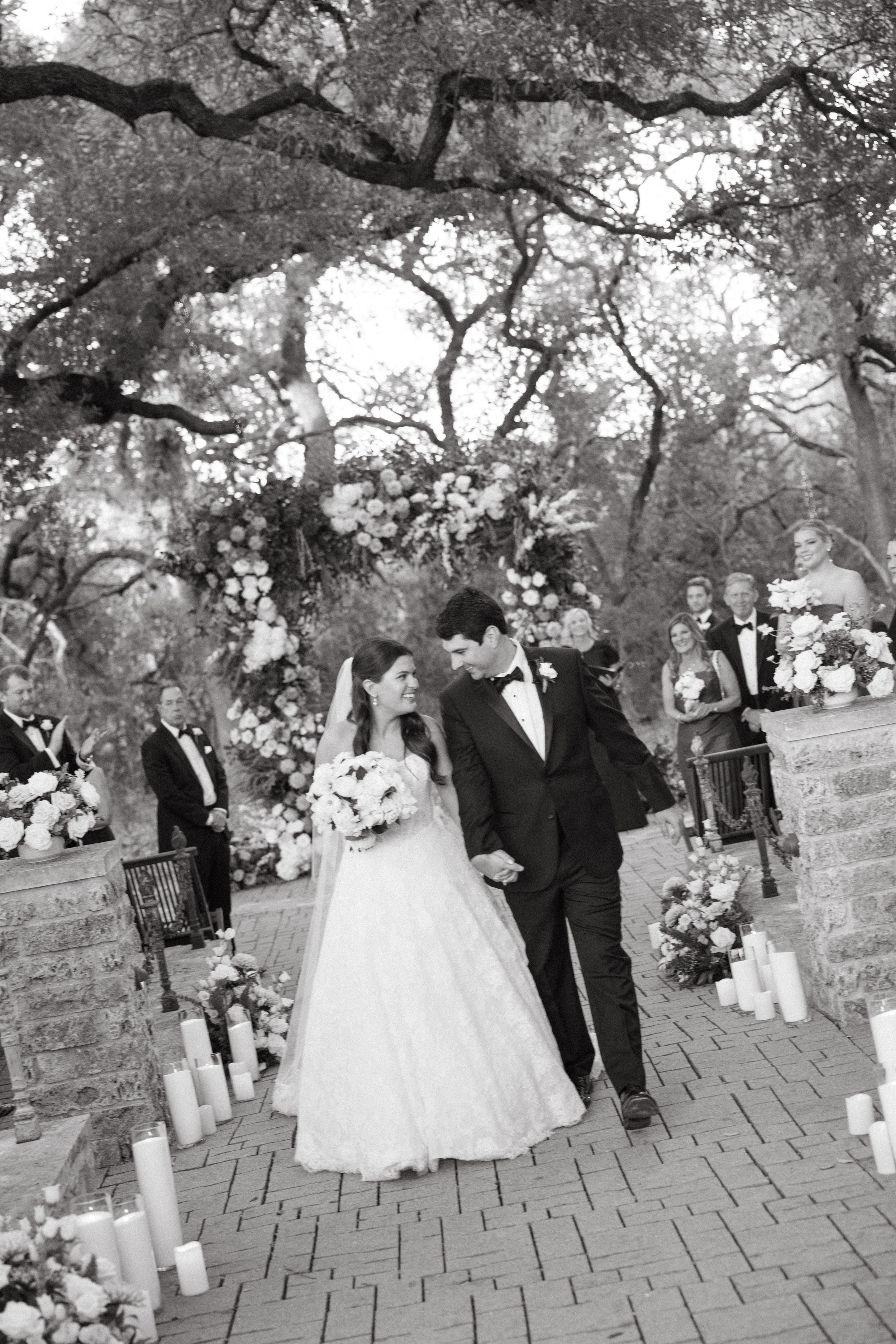 Wedding ceremony under oaks at Camp Lucy Sacred Oaks, Dripping Springs TX — Kristin Cattered Events, film photography by Lauren Nicole