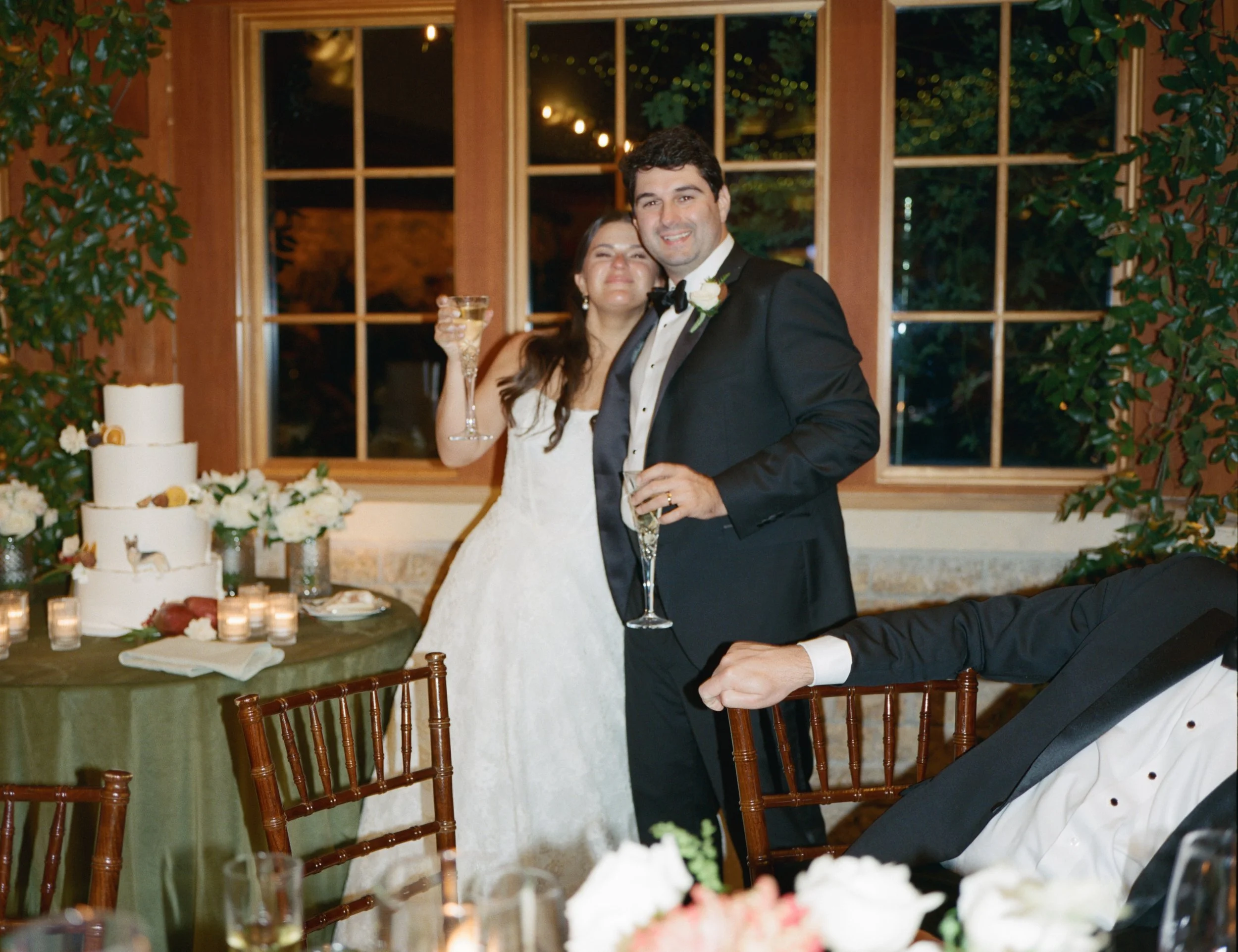 Old money floral wedding reception at Camp Lucy Sacred Oaks — candid documentary dance floor photography by Lauren Nicole Photo