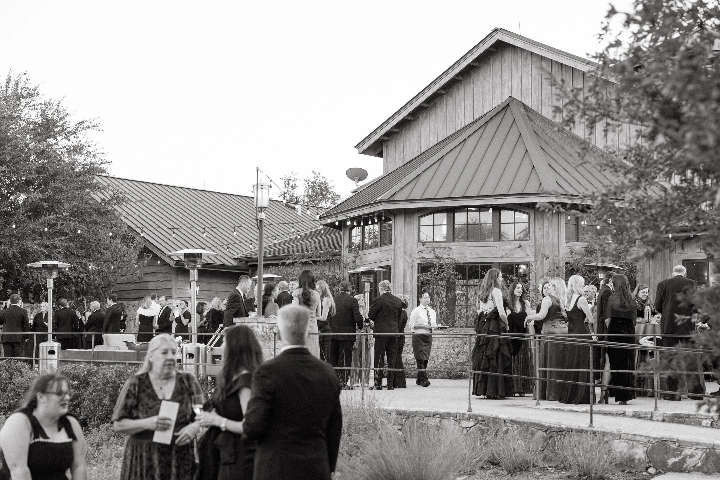 Old money floral wedding reception at Camp Lucy Sacred Oaks — candid documentary dance floor photography by Lauren Nicole Photo