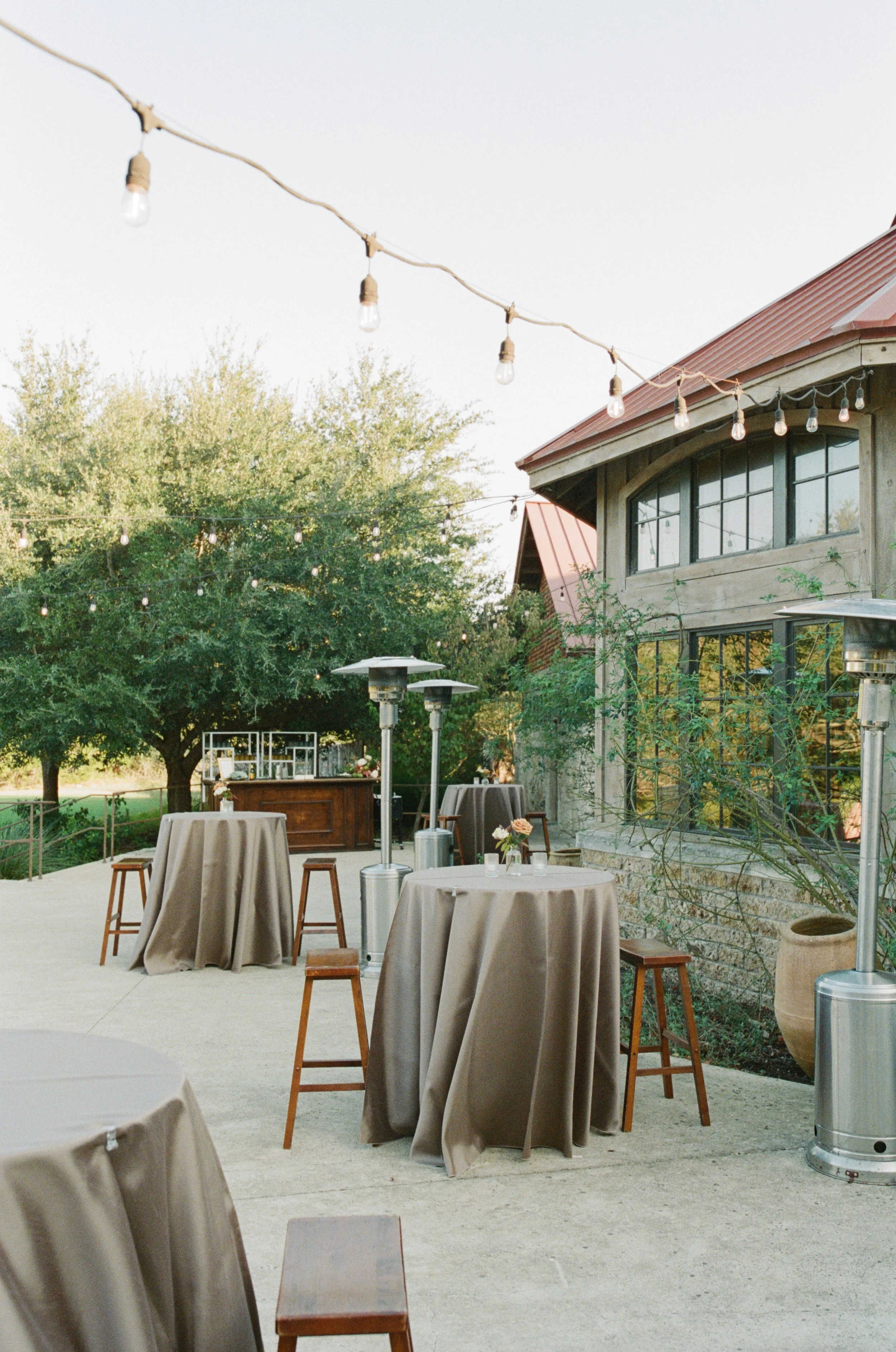 Wedding ceremony under oaks at Camp Lucy Sacred Oaks, Dripping Springs TX — Kristin Cattered Events, film photography by Lauren Nicole