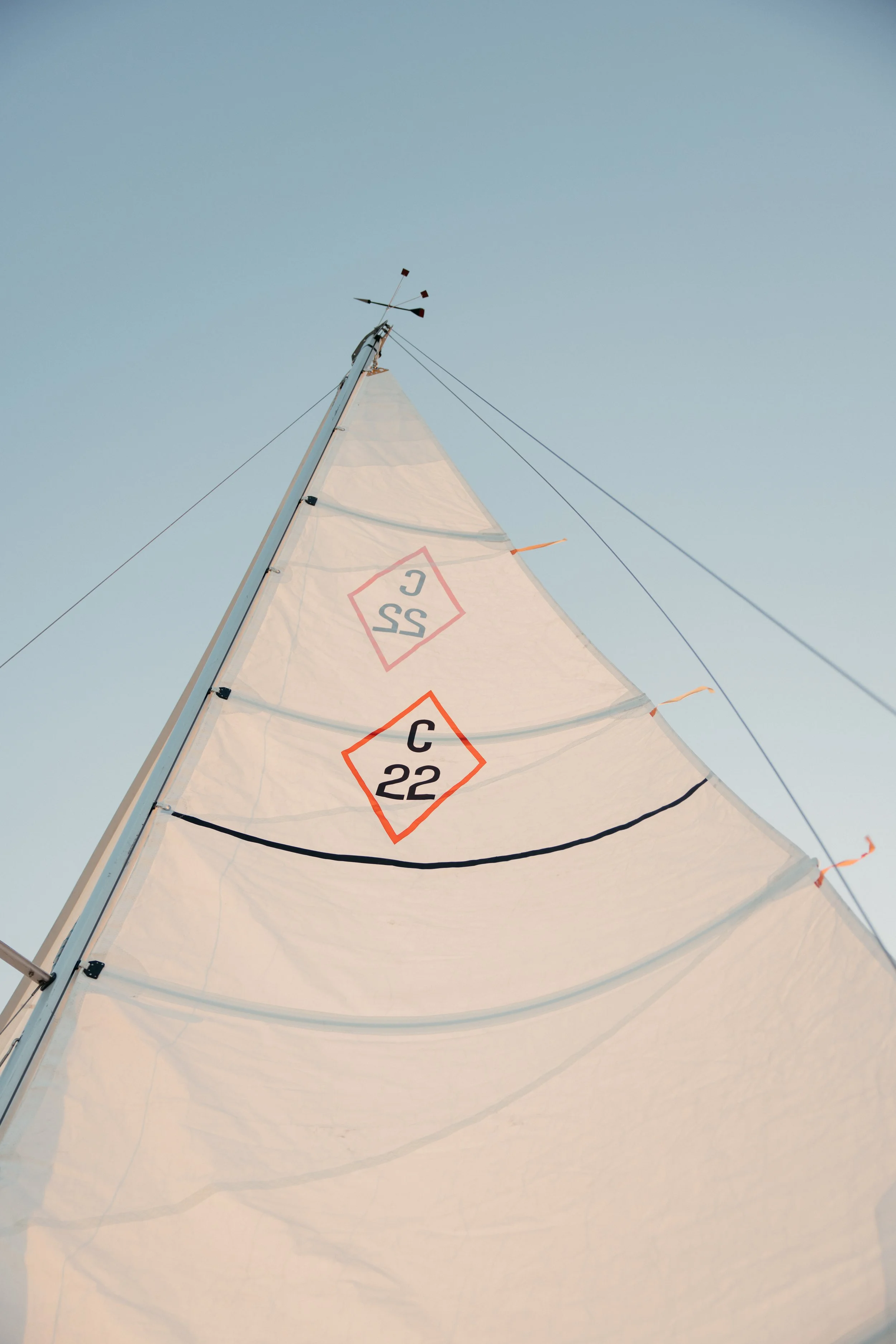 Coastal aesthetic sailboat engagement session, Lake Travis Austin TX — editorial analog photography by Lauren Nicole