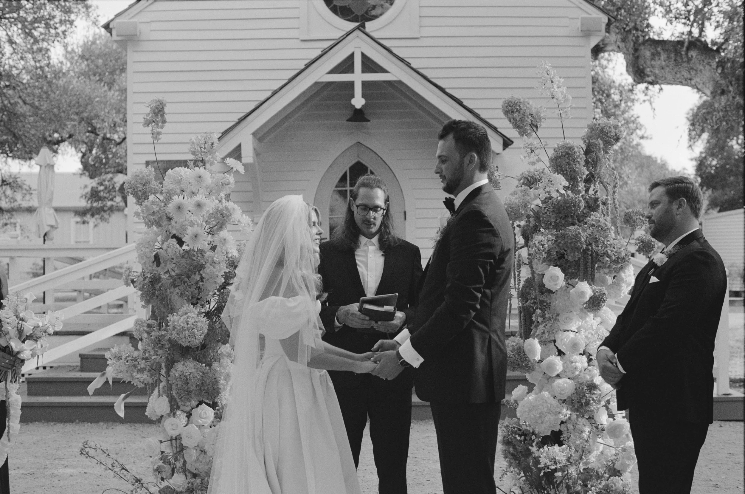 Wedding ceremony at Hotel Lulu Round Top Texas — southern chic western glam, candid film photography by Lauren Nicole Photo