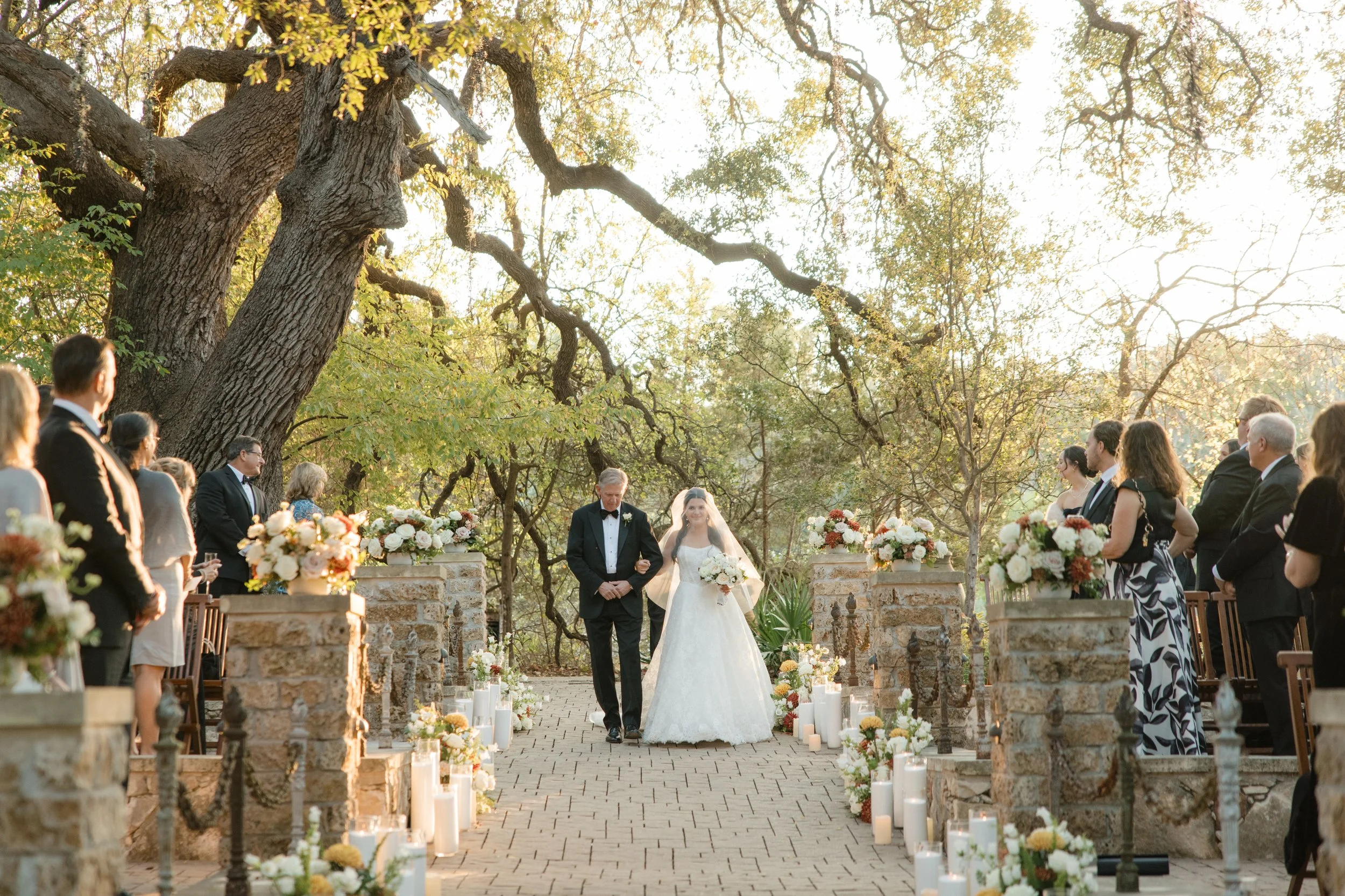 Wedding ceremony under oaks at Camp Lucy Sacred Oaks, Dripping Springs TX — Kristin Cattered Events, film photography by Lauren Nicole