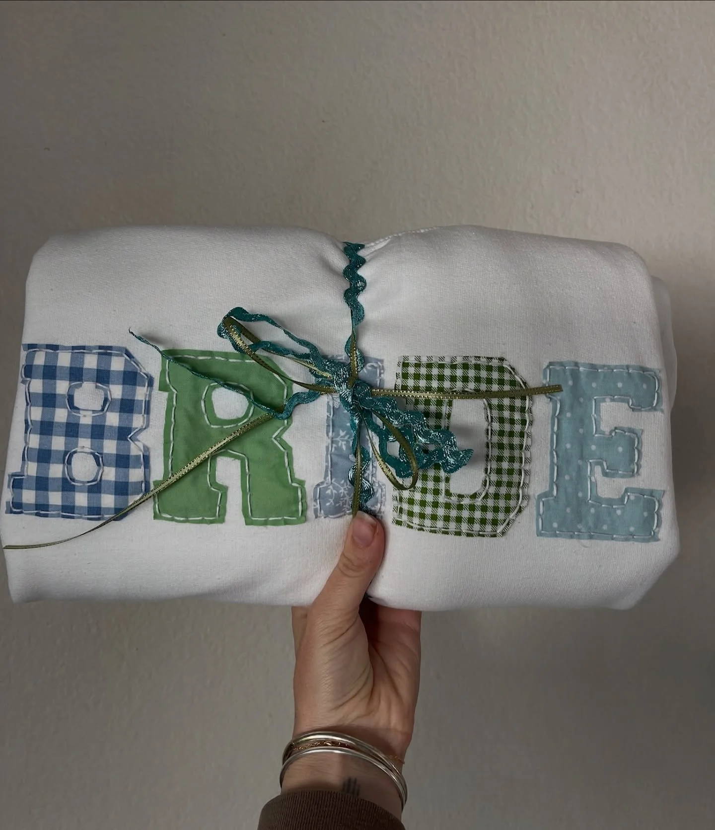 something blue&hellip; 💍 we love making custom pieces for brides to wear as they get ready on their big day!

#stitch #stitched #stitchbygkw #stitchedwithlove #handmade #handembroidered #cusotm #customized #handstitched #embroidery #embroider #embro