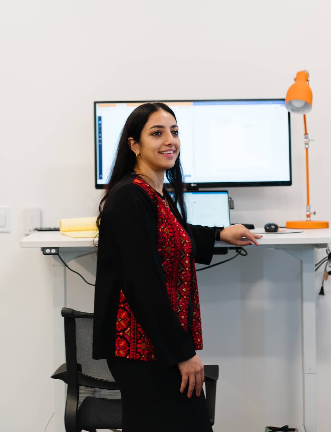 Hermes-Law-Team-Member-Standing-Desk.jpg