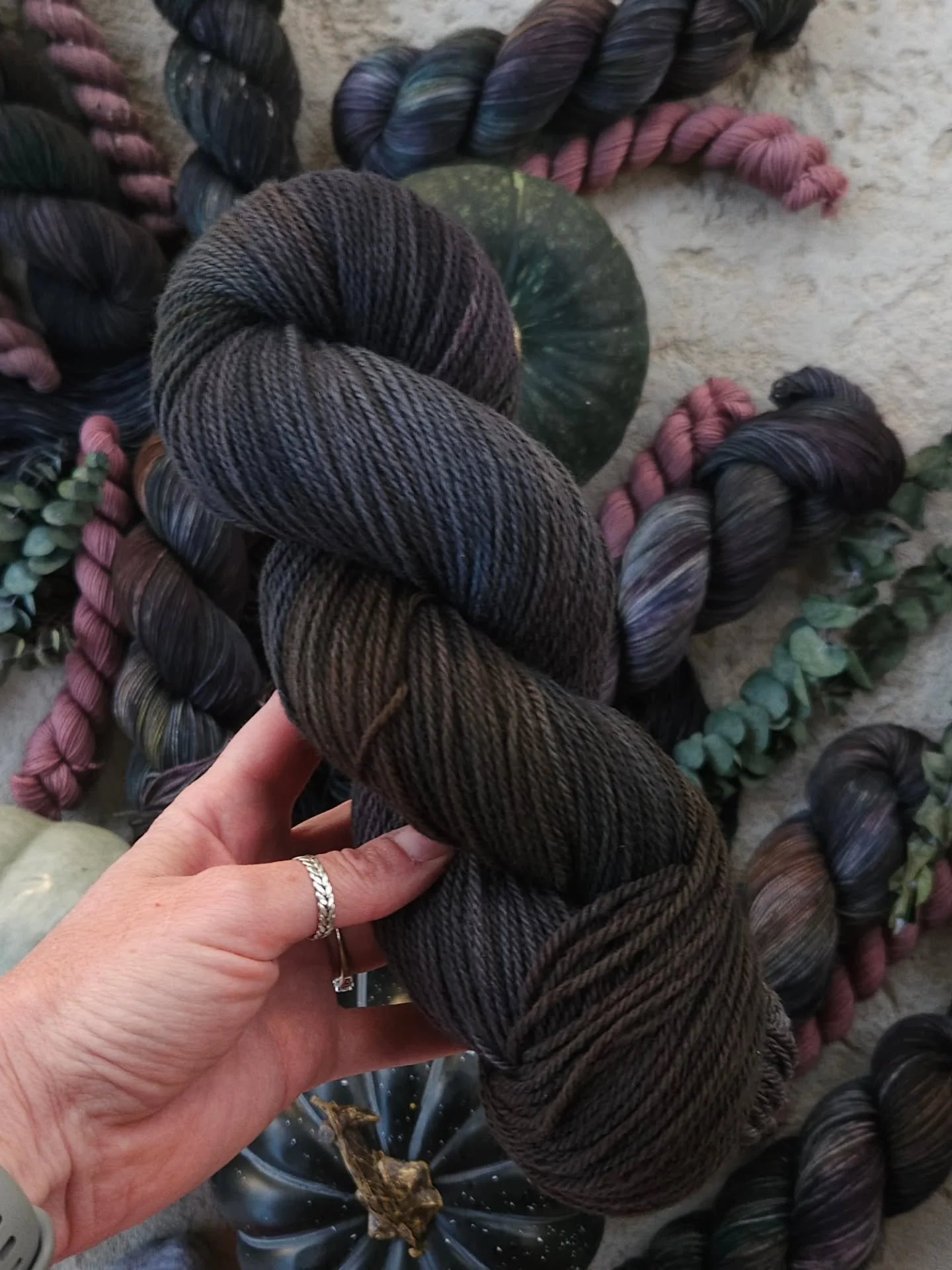 Let's look at some of the bases that will be offered for Moody, but Gourd-geous....

1. Corrie DK (nsw)
2. Merino Fingering (nsw)
3. DK Tweed
4. DK
5. 2-ply Sock

And go figure that some of the other base pics I took came out blurry. A rain storm was