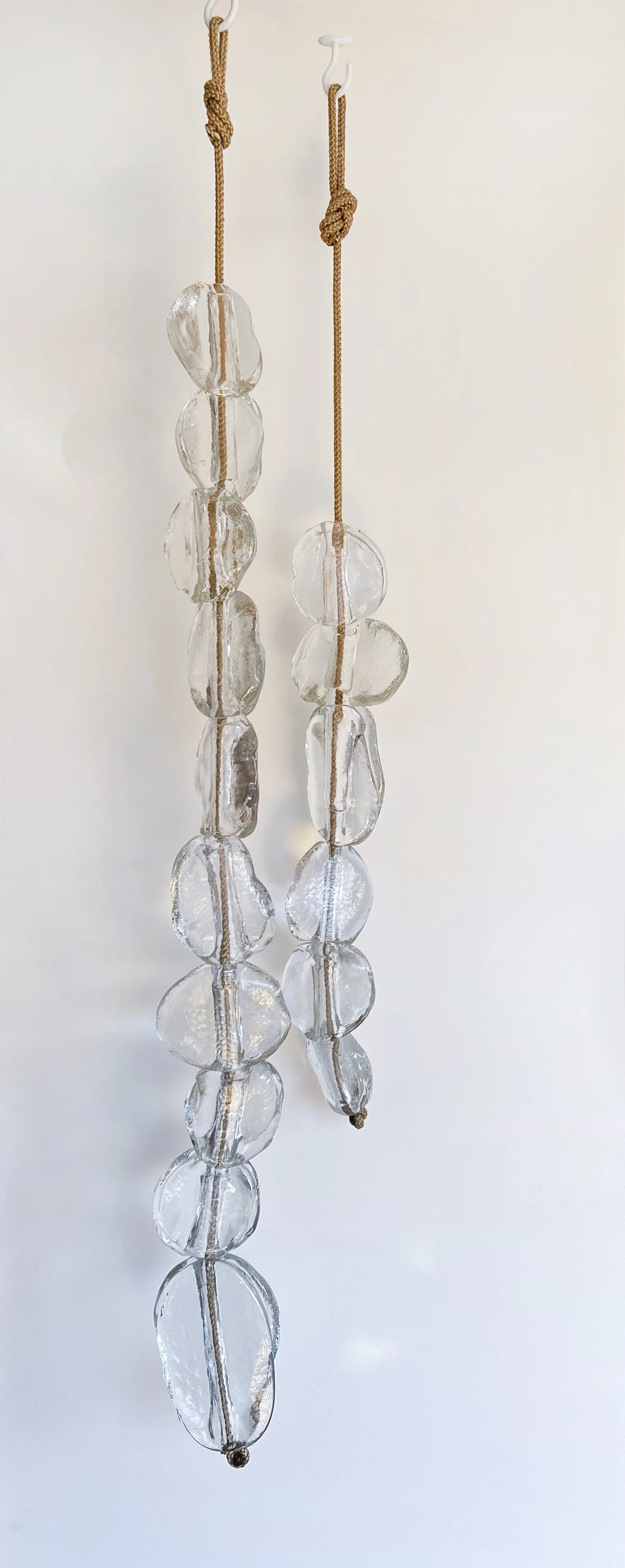 CARMEN SALAZAR  
Float Series (2026)  
Hand cast glass and repurposed gold marine rope 
 
Float 10:  
61” x 5”  
$6,000  
 
Float 6:  
50” x 5”  
$3,600  