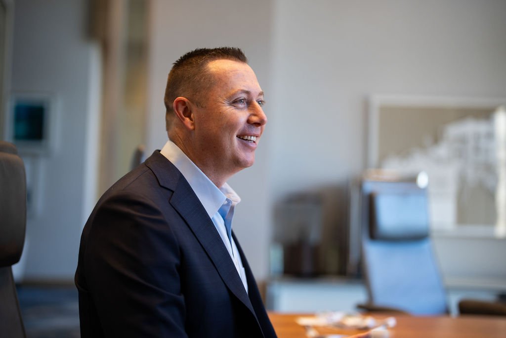 Tyler Milligan smiling at an event