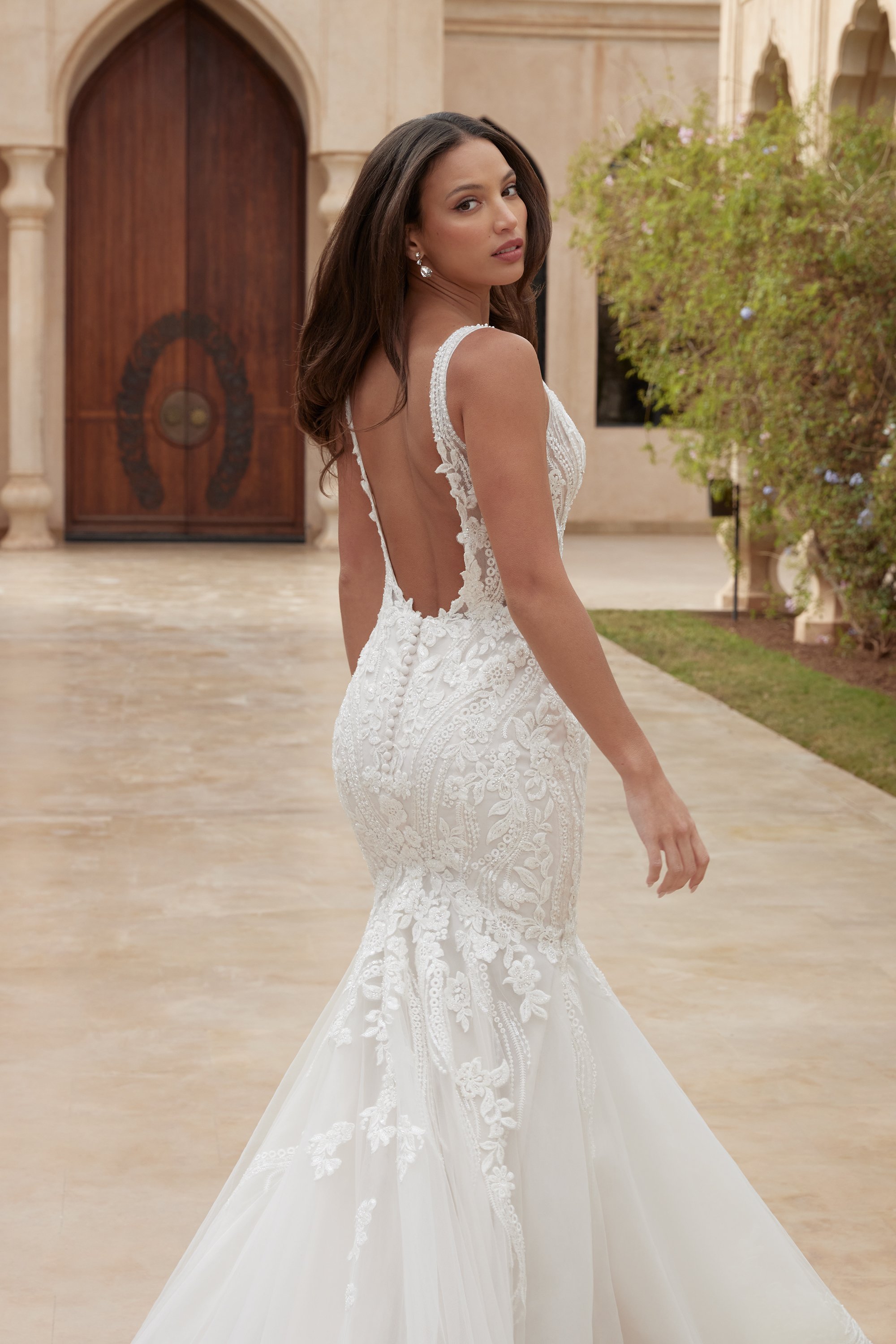 Sincerity Bridal 44426 trumpet wedding gown with plunging V-neck, sheer bodice and low back