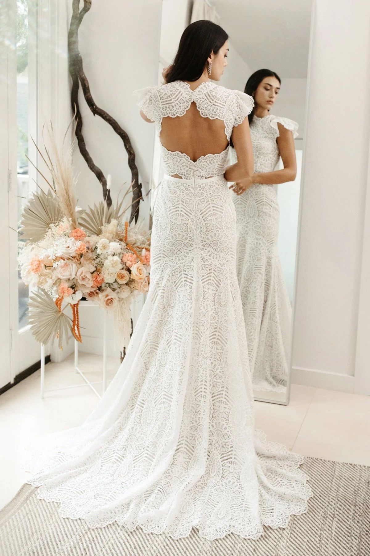 Willowby Cosette 56103 fit-and-flare wedding dress with Aspen lace, ruffle sleeves, open back, and fluted skirt