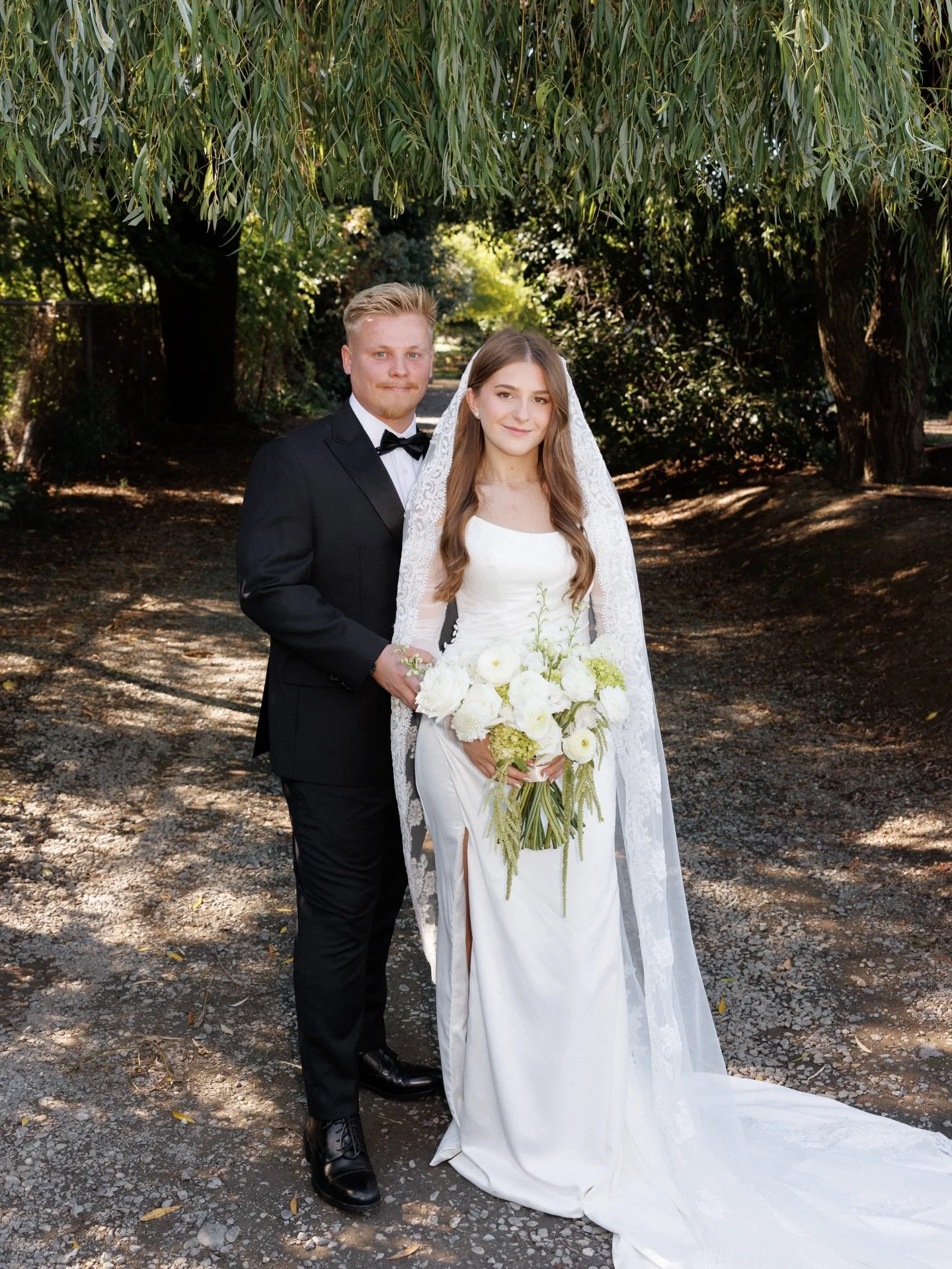Love grows where it&rsquo;s nurtured&mdash;just like this moment beneath the willow tree 🤍🌳

Congratulations to Elianna &amp; Mark wishing them a lifetime of love and happiness! 🥂✨

Dress: Jack by @serenebymadilane 
Photographer: @gritsanphotograp