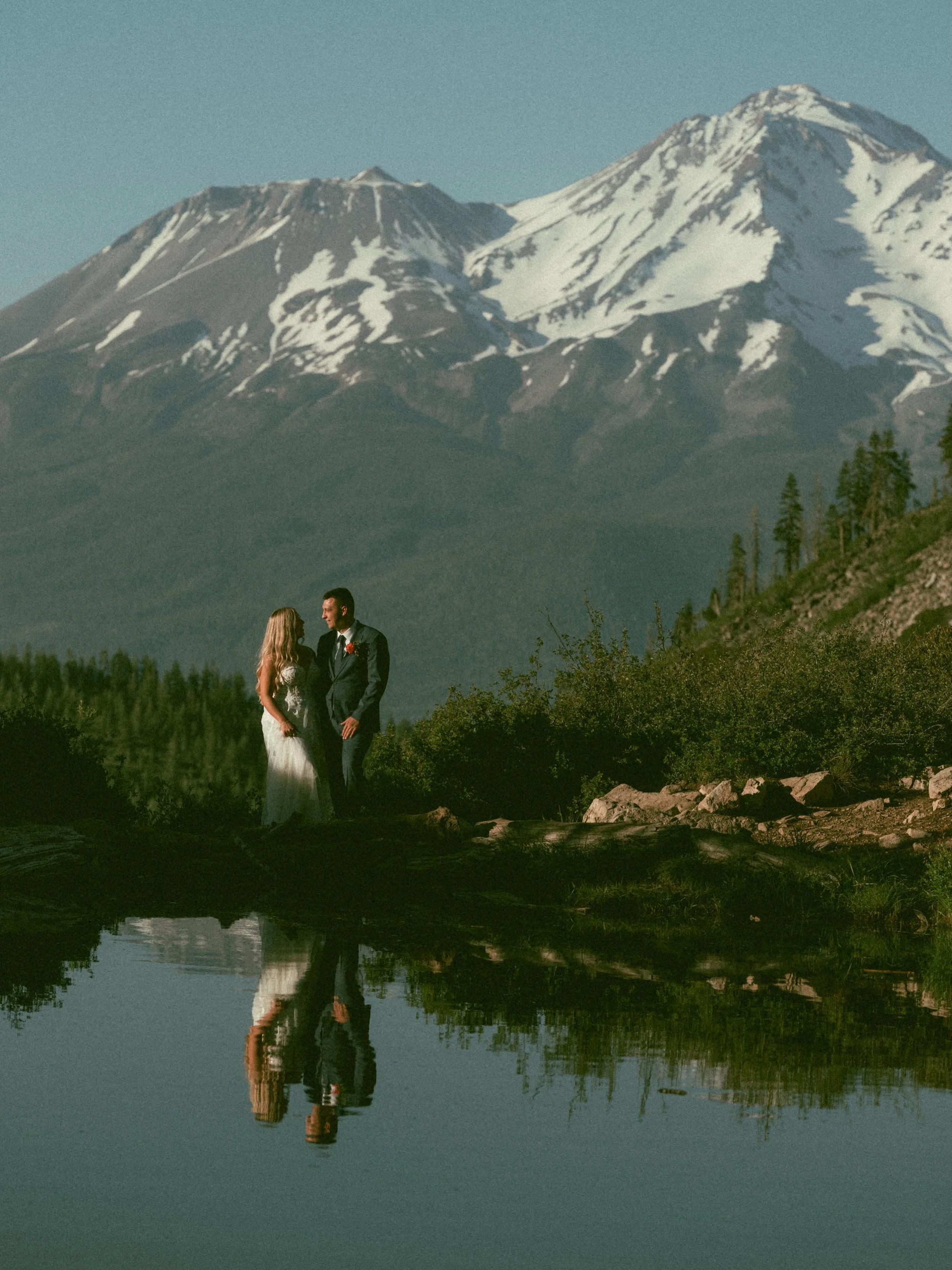 A love story with a view ⛰️🤍🌾

Congratulations to Claire &amp; Colby! Wishing you both a lifetime of love and happiness 🥂✨

Photographer: @joshlynwrightphoto 
Dress: Ivy by Flora by @oliveandivorybride 
Alterations: @thealterationssuite

#affordab