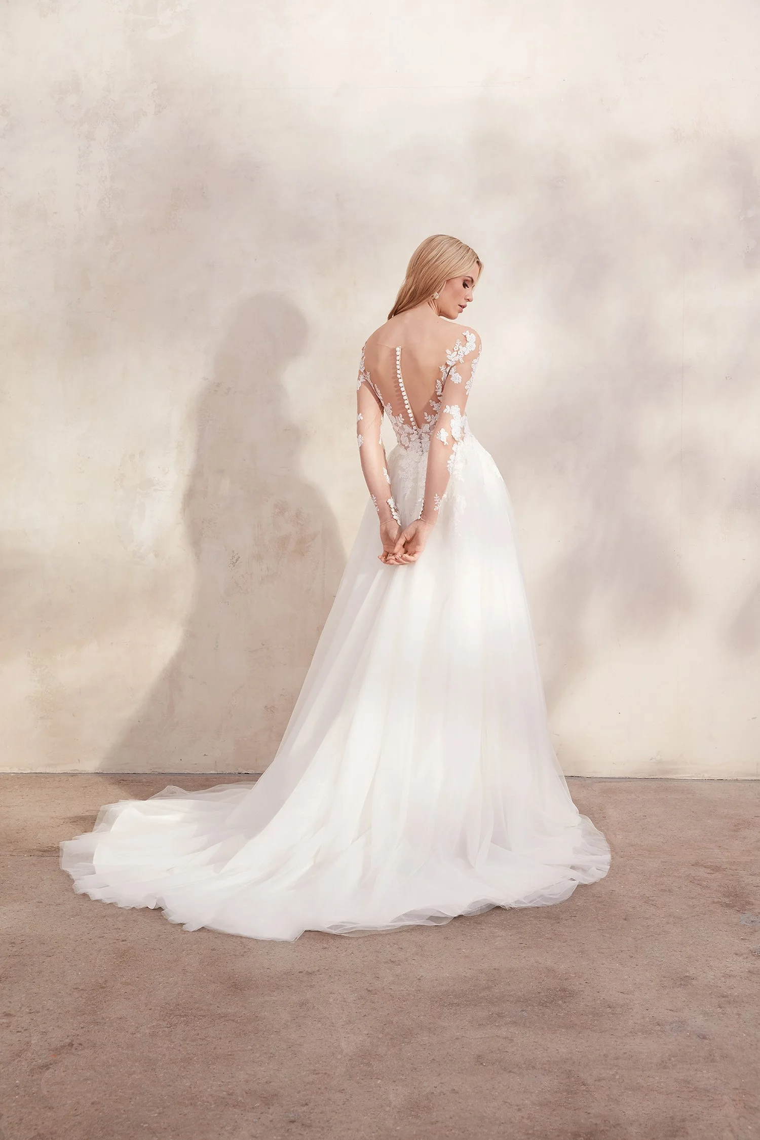 Adore by Justin Alexander Clarabella 11278 wedding dress, ivory/nude A-line bridal gown with illusion Sabrina neckline and long sleeves, sample size 14, available at Olive and Ivory in Sacramento