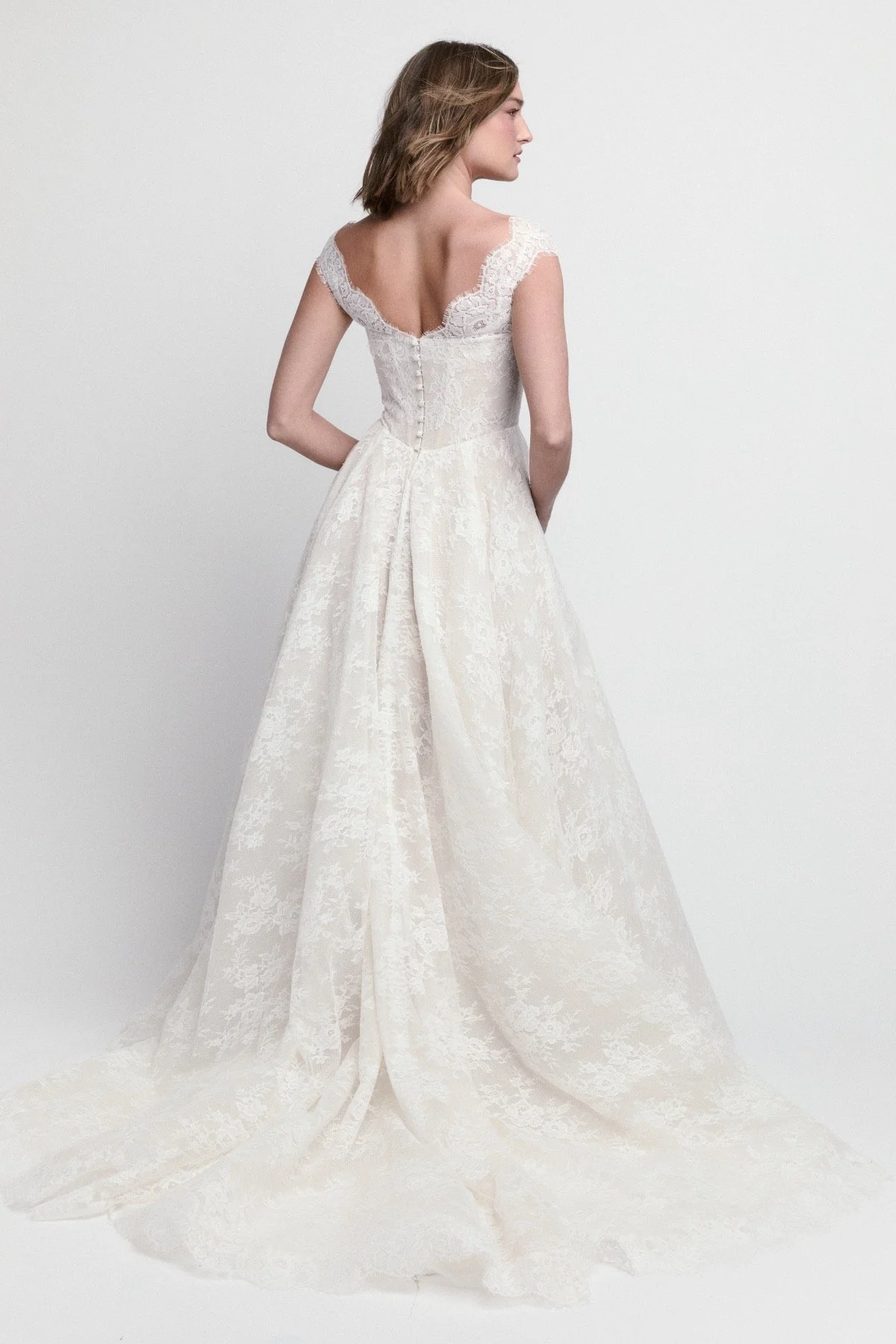 Locket Louetta A-line wedding dress with V-neckline, cap sleeves, and floral Rose Bouquet lace detail