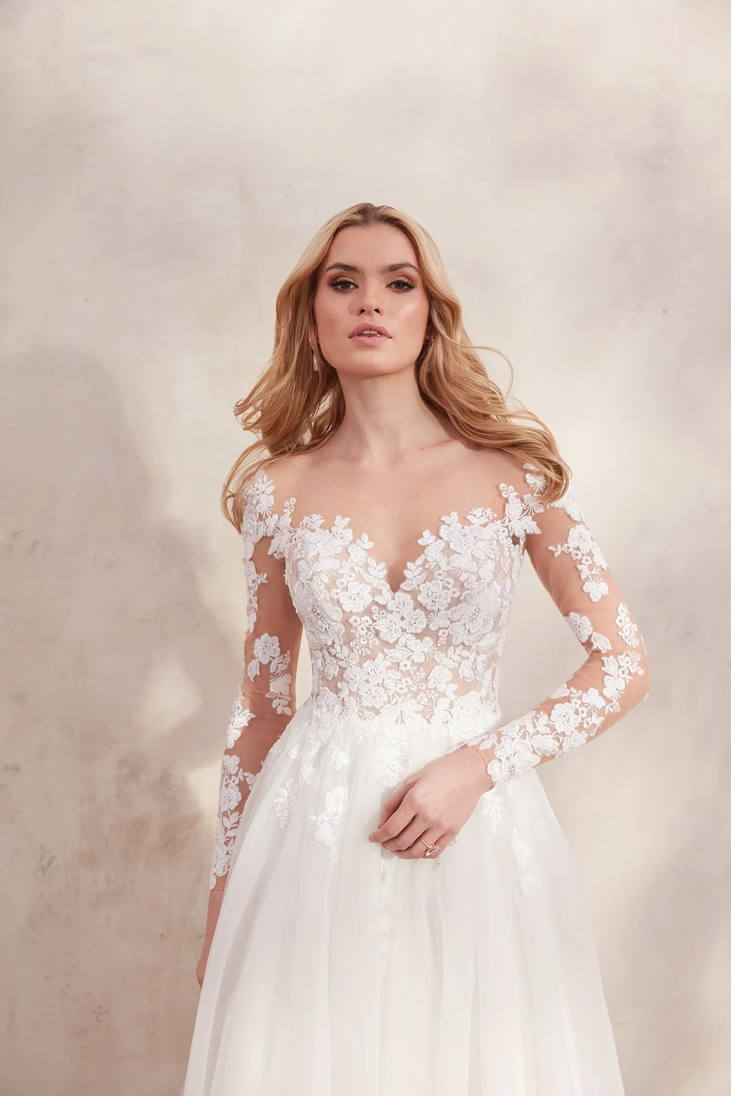 Adore by Justin Alexander Clarabella 11278 wedding dress, ivory/nude A-line bridal gown with illusion Sabrina neckline and long sleeves, sample size 14, available at Olive and Ivory in Sacramento