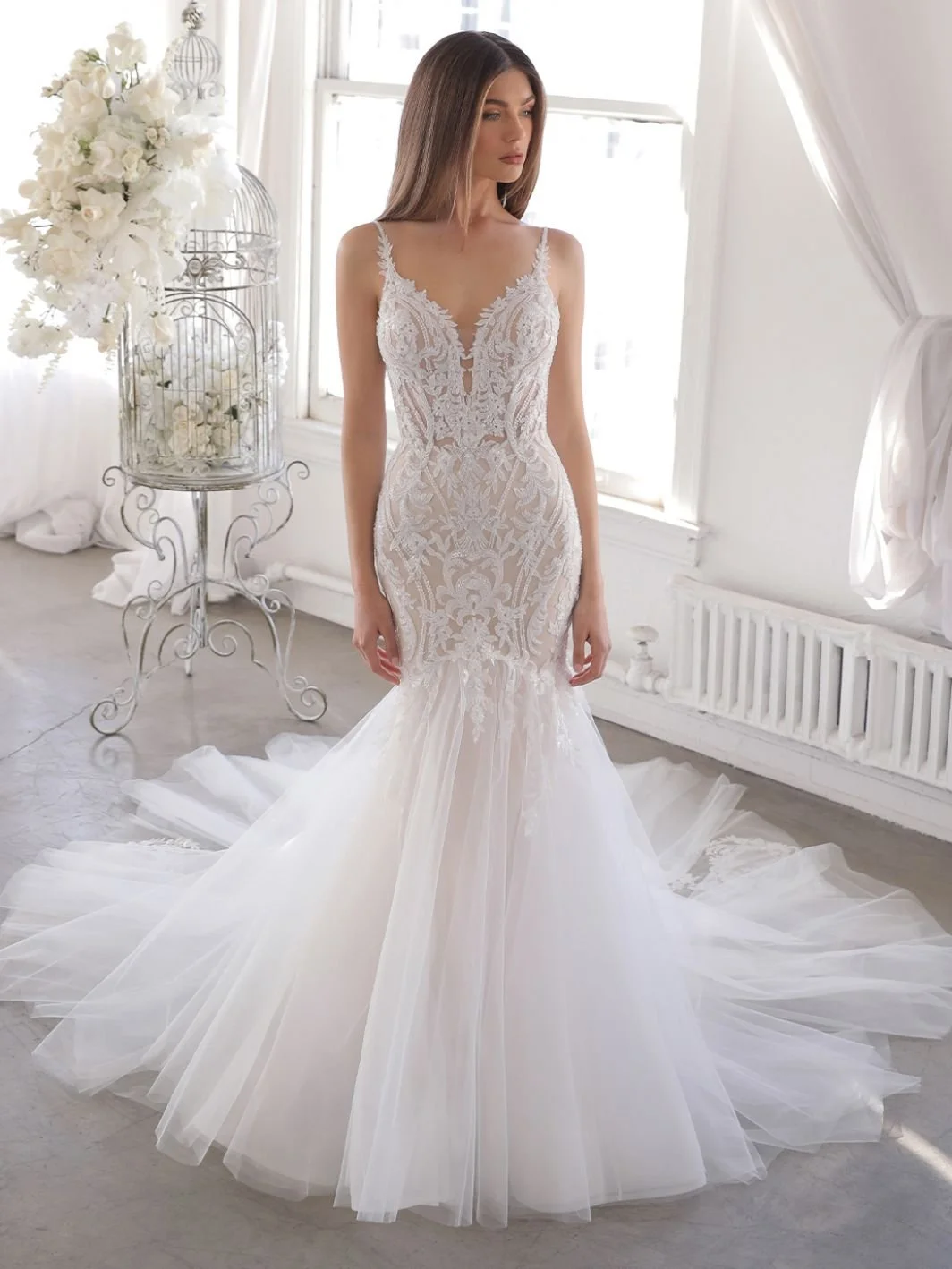 Enzoani Blue Onelia spaghetti strap mermaid wedding gown with plunging sweetheart neckline and low illusion lace back