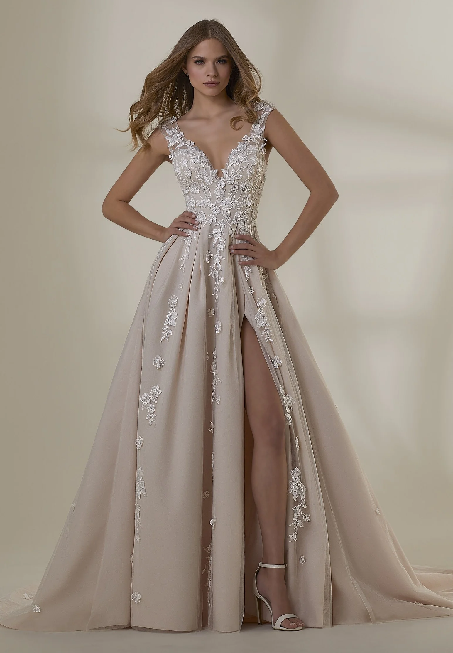 Mori Lee Marlowe 2551 ivory/latte/honey A-line wedding dress with deep V-neckline, crystal beaded 3D floral lace bodice, pleated tulle skirt and front slit