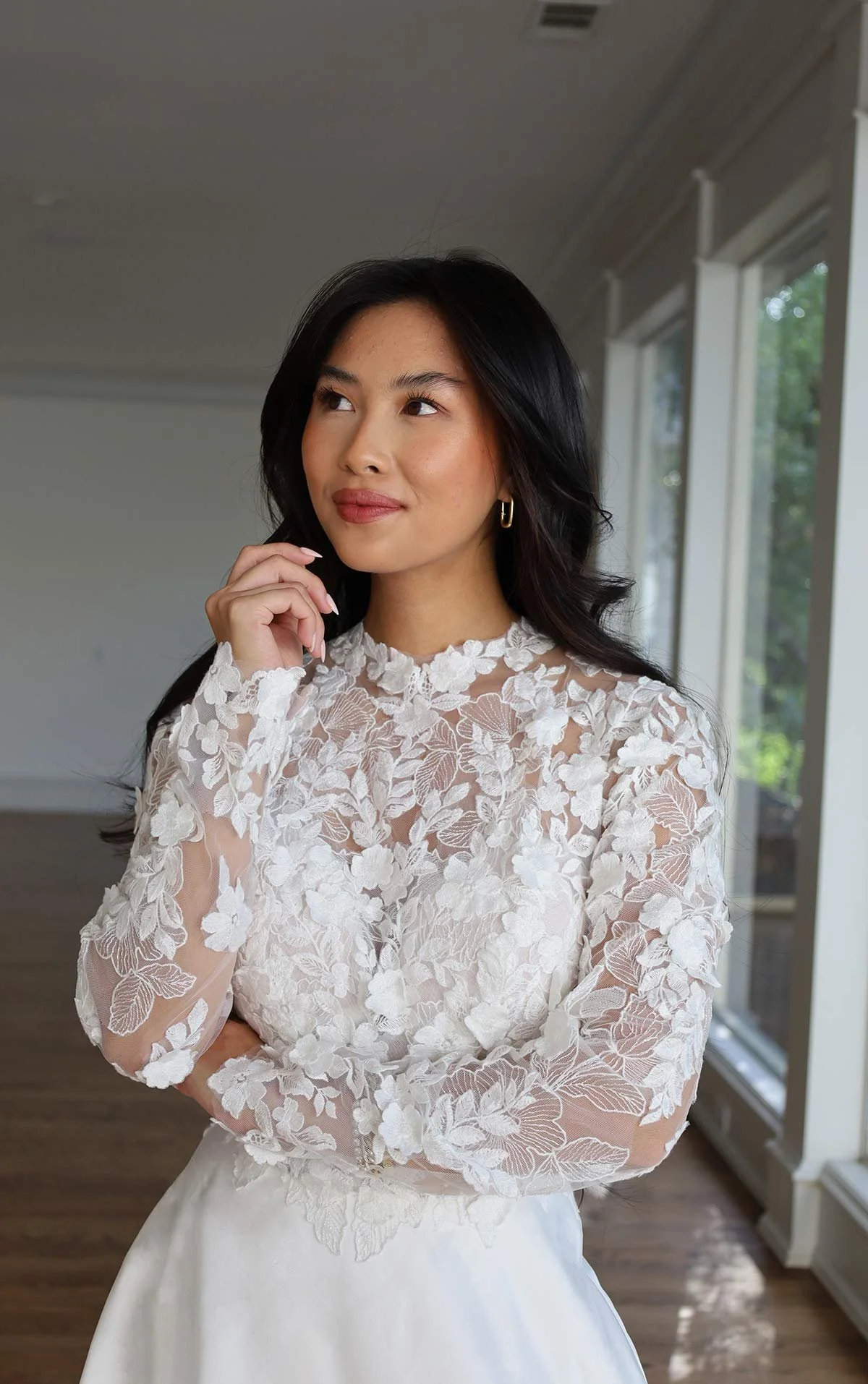 Essense of Australia D3715ZZ A-line wedding dress with high lace neckline and long sleeves
