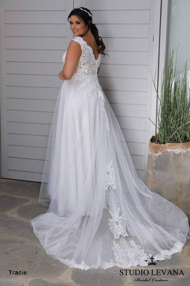 Studio Levana Tracie tulle A-line wedding dress with lace bodice and plunging V-neckline