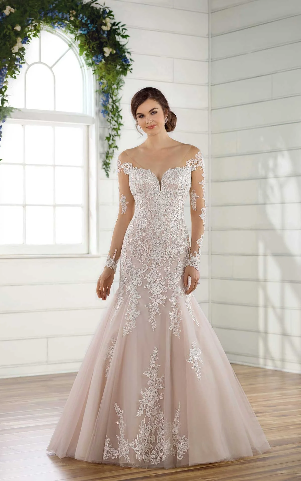 Essense of Australia D2425 fit-and-flare wedding gown with off-the-shoulder long lace sleeves, illusion open back, and pearl buttons