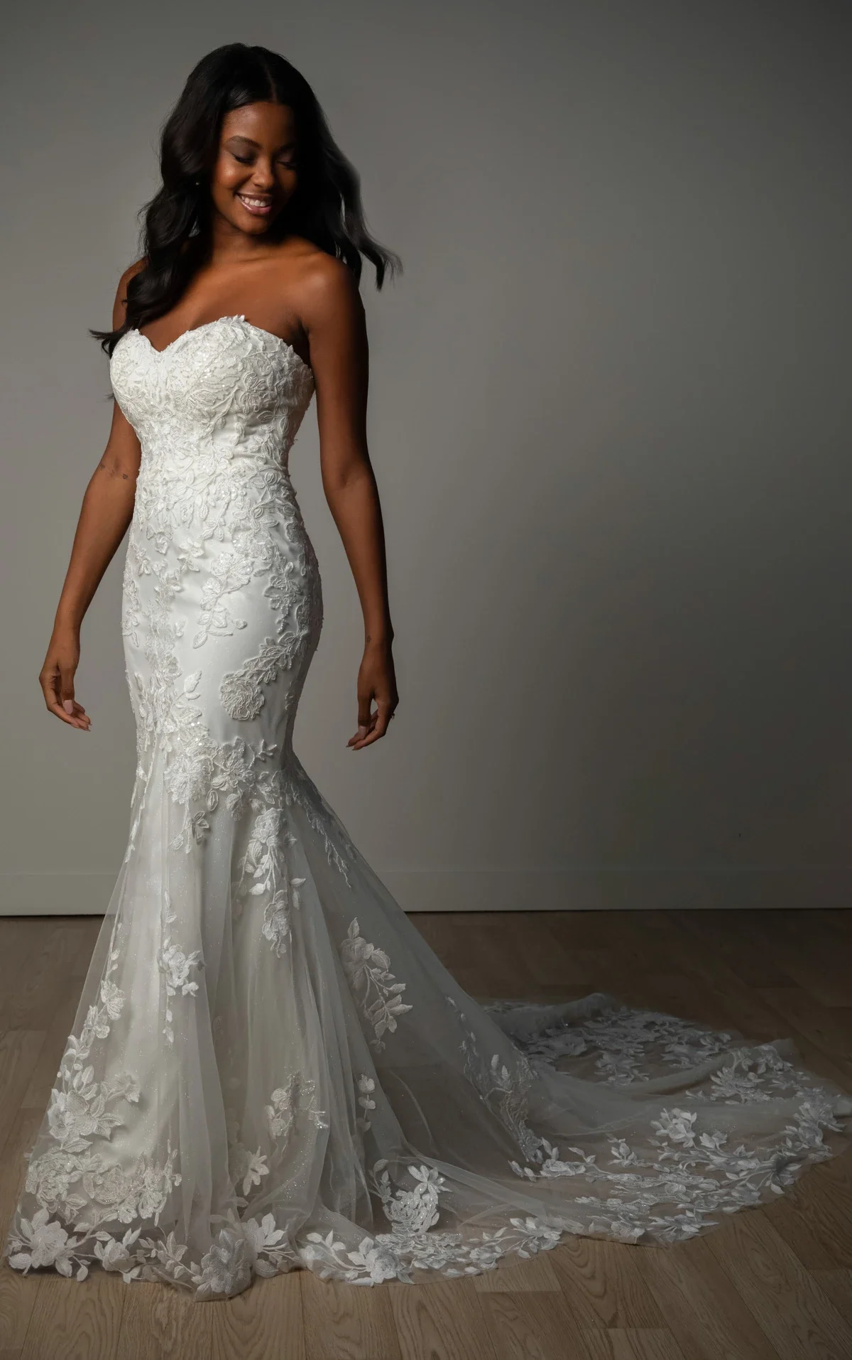 Shimmering Lace and Tulle Trumpet Wedding Gown with Sequin Floral Appliqués