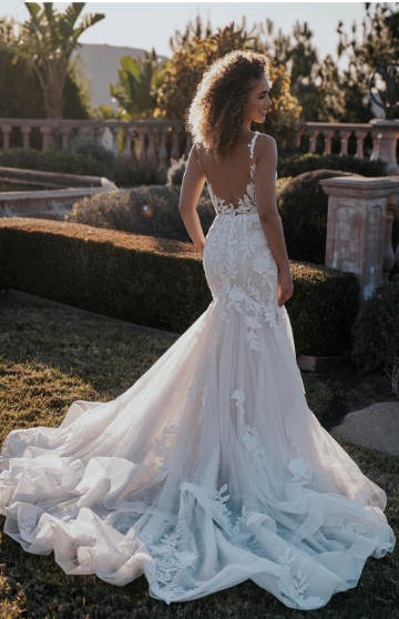 Allure Bridals A1156 fit and flare lace wedding dress with matte lace appliques over Chantilly lace, plunging neckline, and open low back