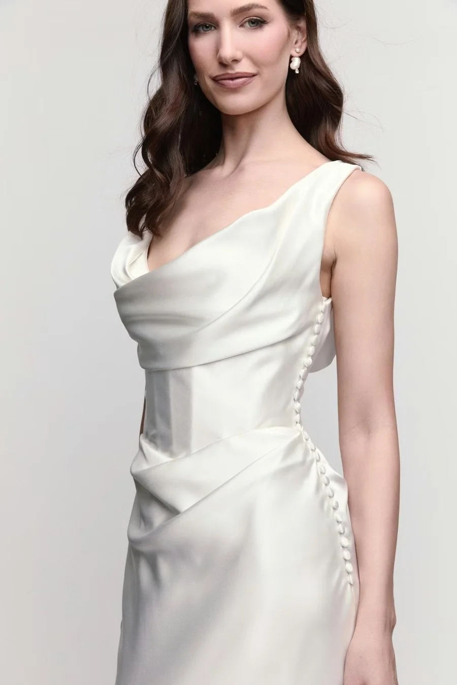 Locket by Watters Amaryllis — sleek scoop-neck sheath wedding dress in charmeuse with draped bust, visible corset boning, drop waist, and side buttons