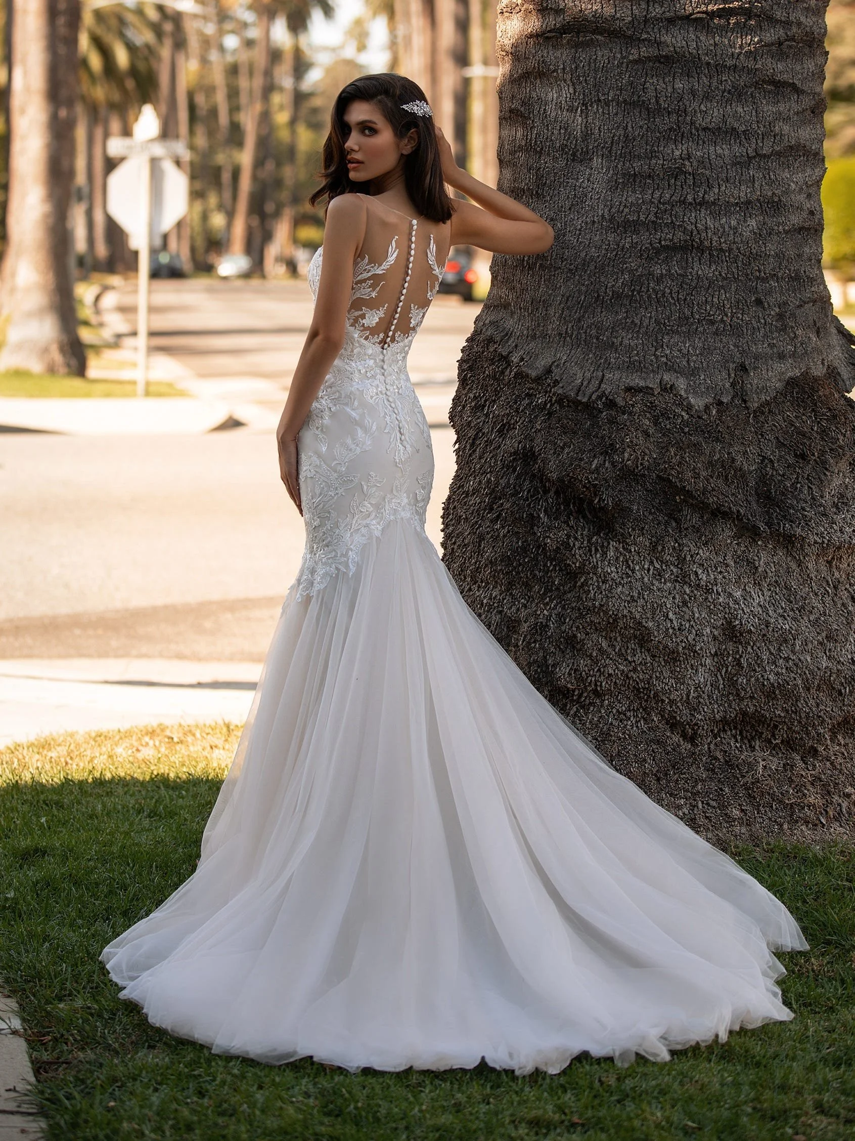 Pronovias Scott V-neck mermaid wedding gown with cascading lace applications and tulle skirt