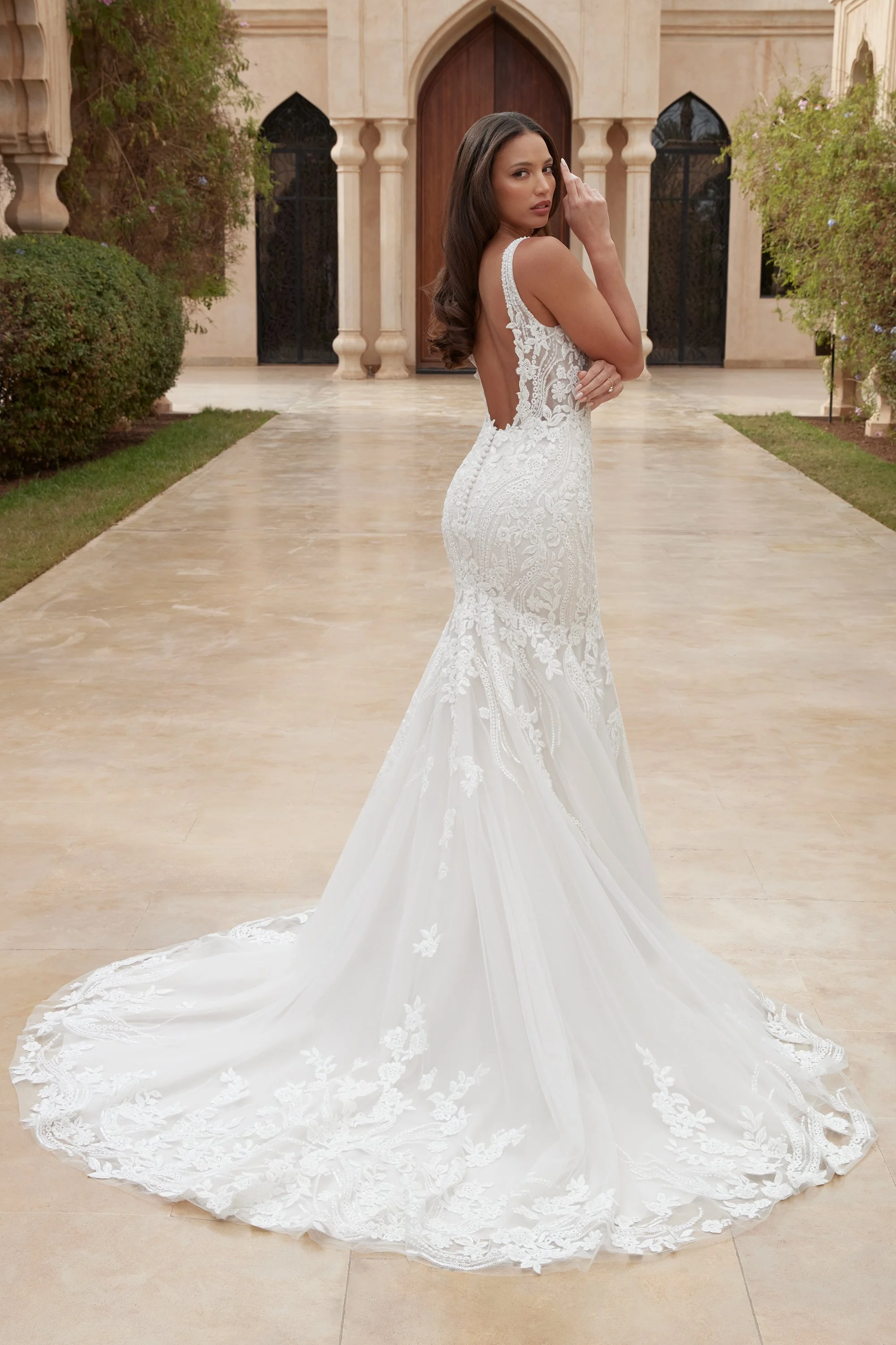 Sincerity Bridal 44426 trumpet wedding gown with plunging V-neck, sheer bodice and low back