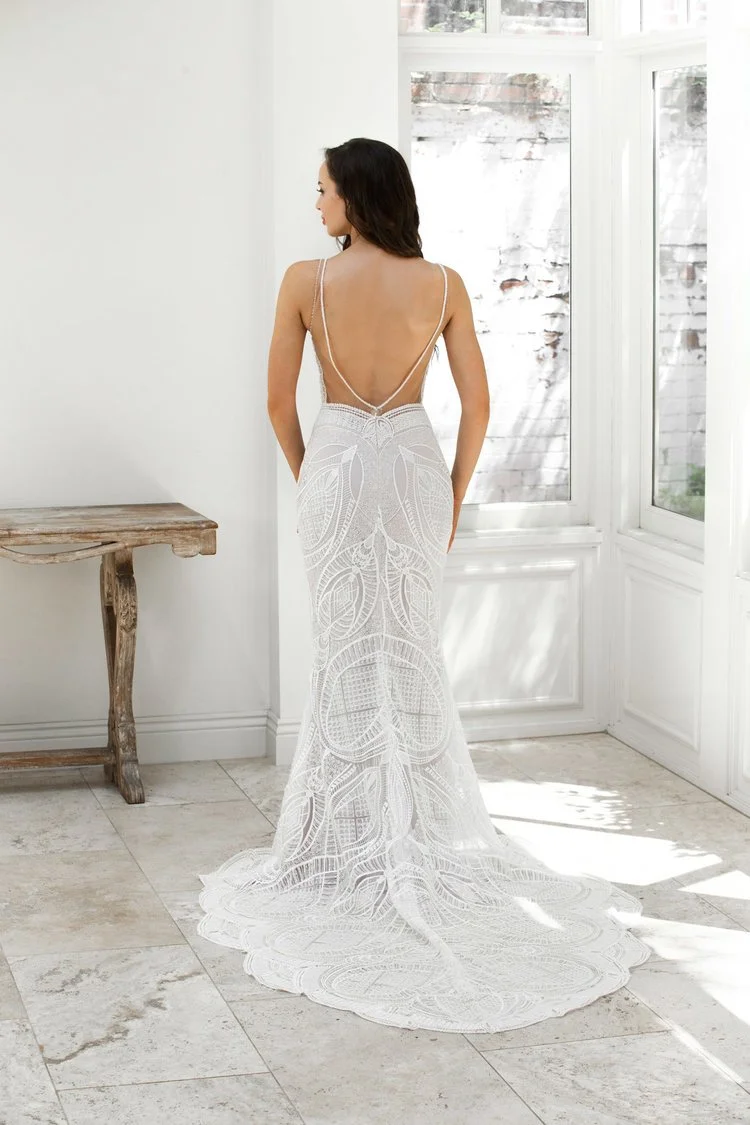 Cizzy ZB215-1Z Zavana Bridal straight skirt wedding dress with plunging V-neckline, laser cut lace, and illusion low back