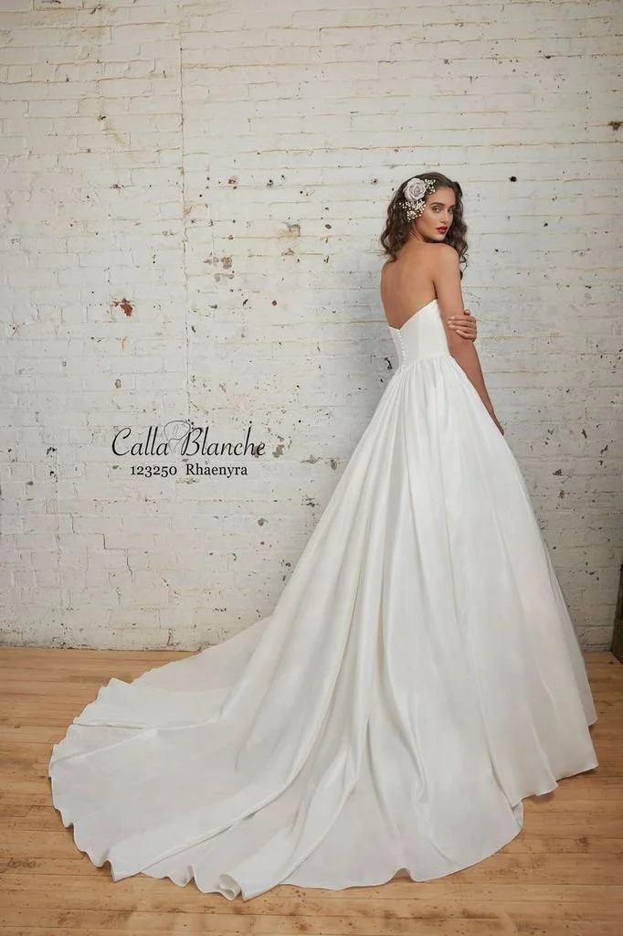 Calla Blanche Rhaenyra 123250 strapless ballgown wedding dress with sweetheart neckline, optional off-shoulder puff sleeves, and dramatic train
