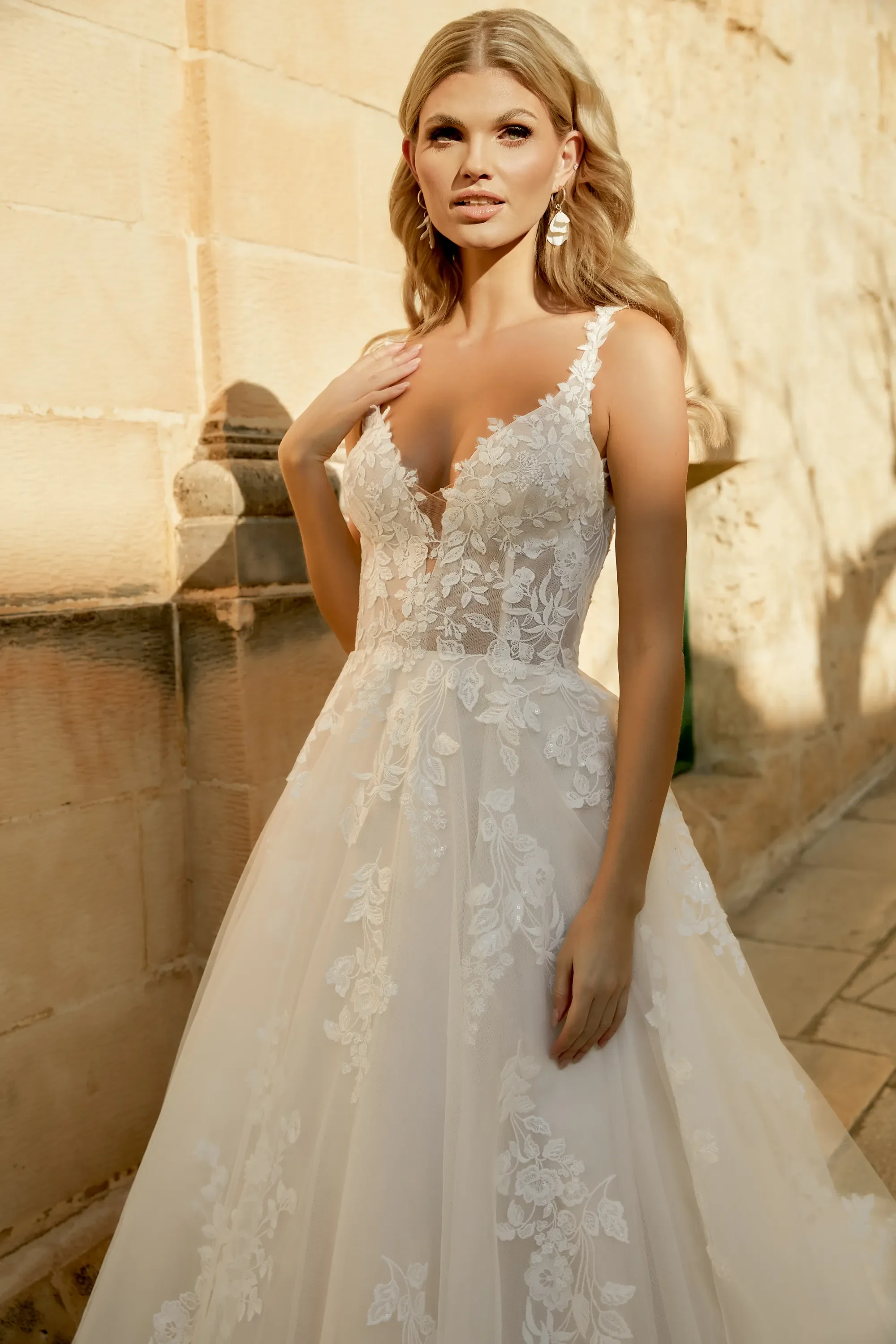 Sincerity 44492 A-line wedding dress with plunging V-neckline and sequin lace appliques