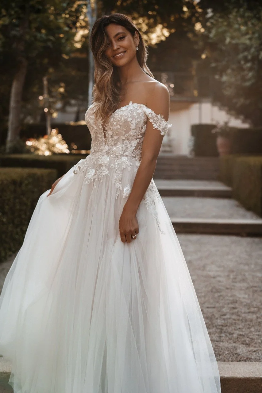 Plus Size Allure Bridals 9914 off-the-shoulder tulle A-line wedding dress with lace bodice and floral accents