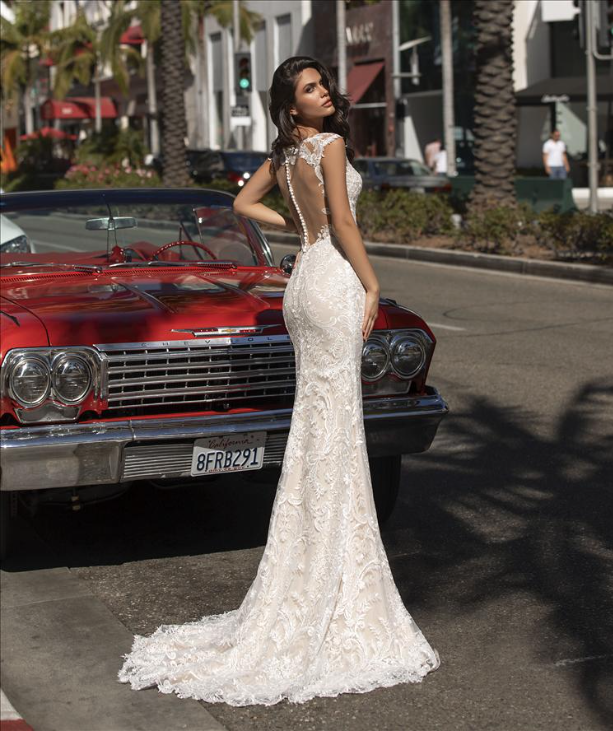 Pronovias Loren fitted mermaid wedding gown with lavishly embroidered tulle and court train