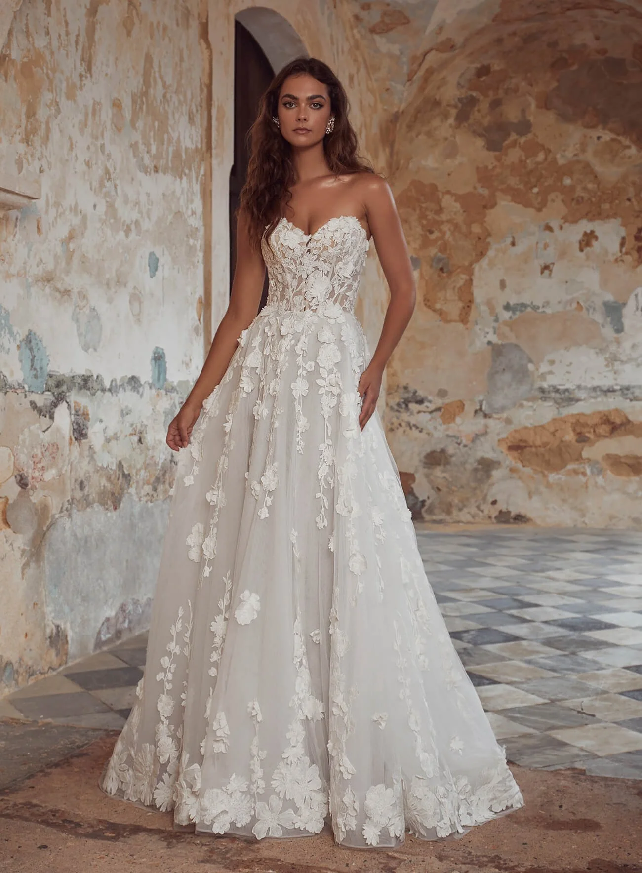 Calla Blanche Shania 123111 strapless A-line wedding dress with 3D floral lace, detachable long sleeves, and pockets