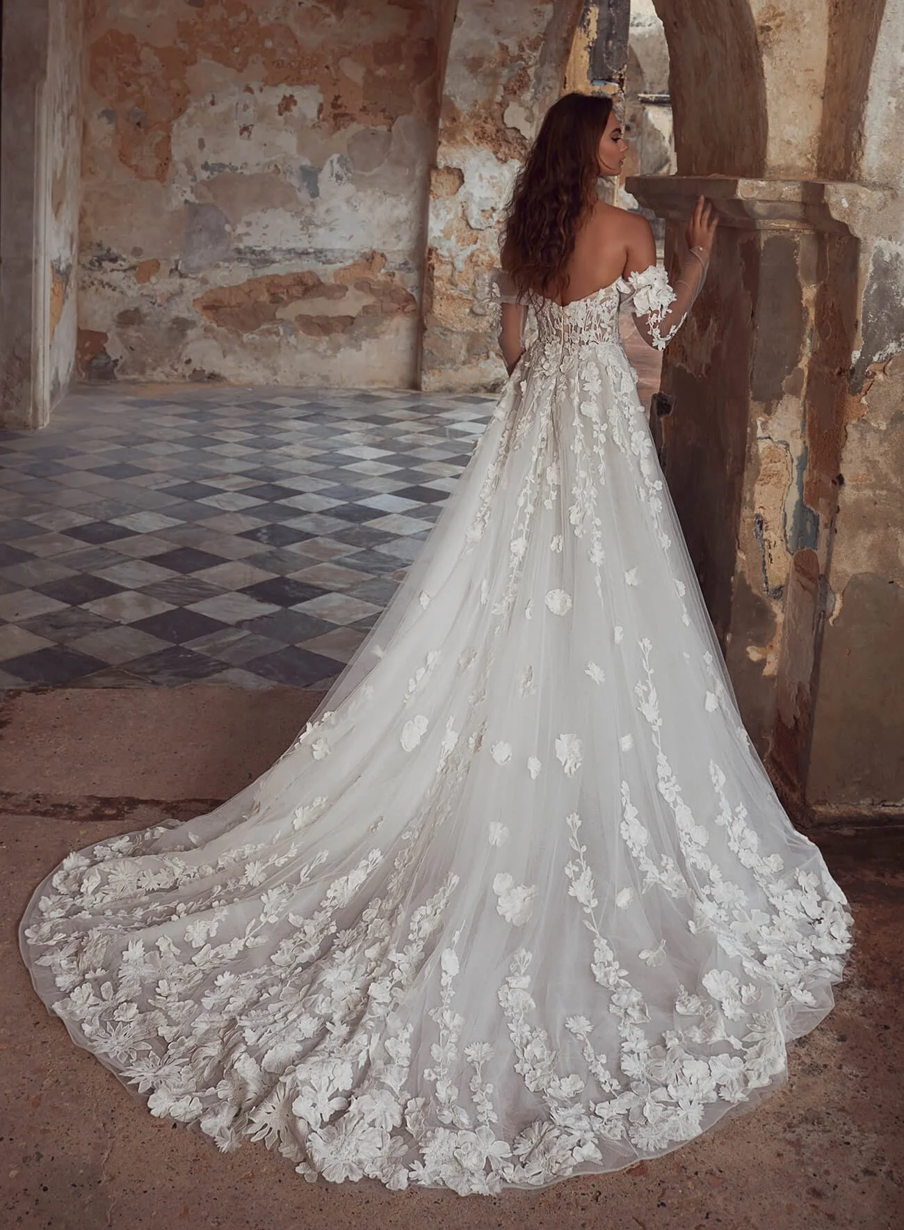 Calla Blanche Shania 123111 strapless A-line wedding dress with 3D floral lace, detachable long sleeves, and pockets