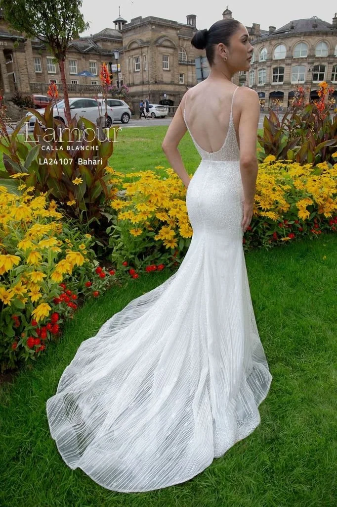 L'amour Bahari LA24107 sparkly beaded lace sheath wedding dress with plunging V-neckline