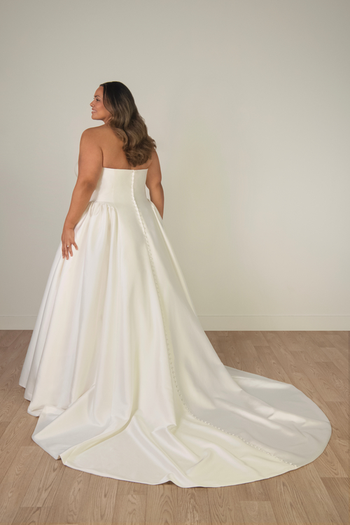 Plus Size Strapless Mikado A-Line Wedding Gown with Architectural Seaming and Pockets