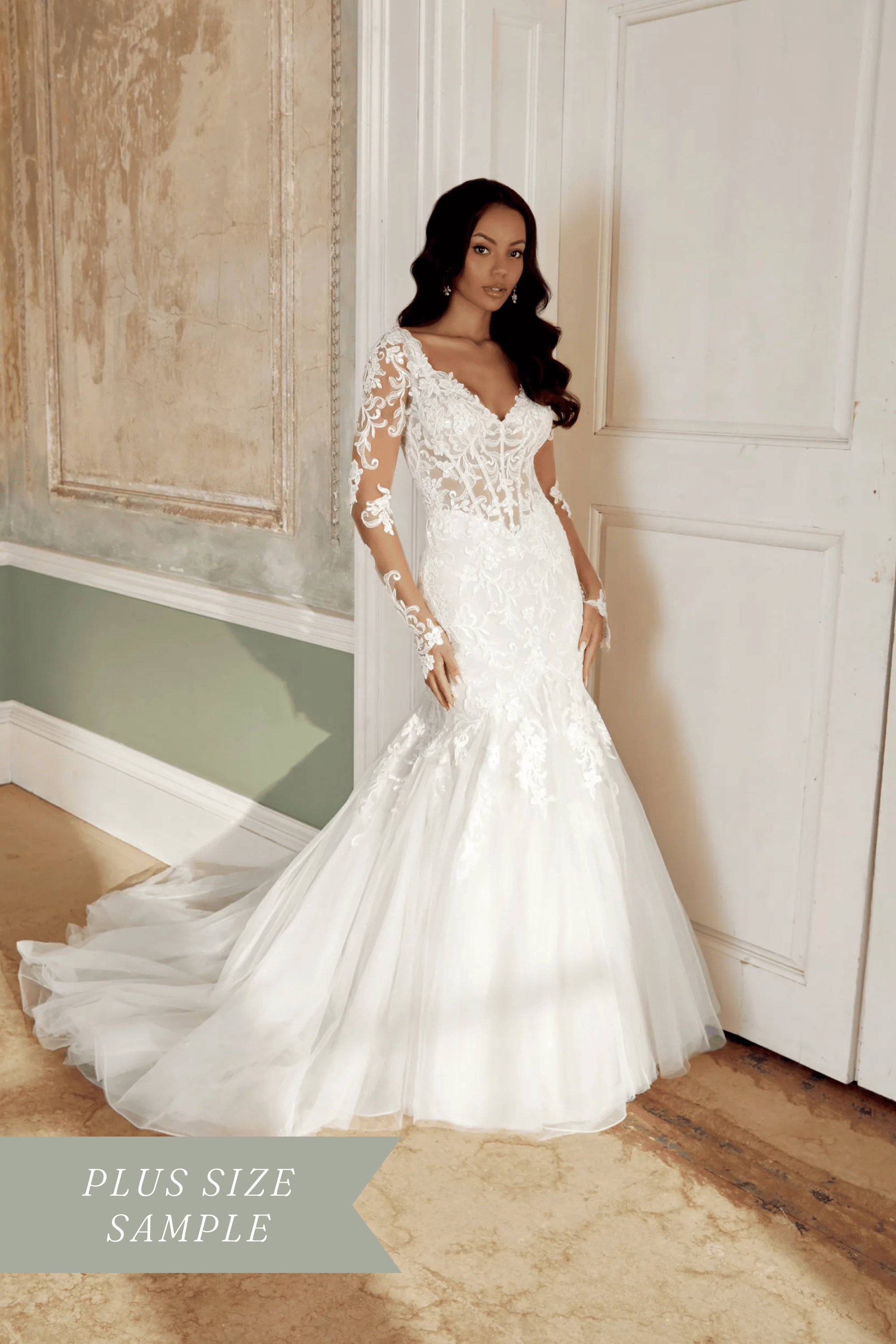 Sincerity 44542 — plus-size mermaid wedding dress with V-neckline, basque waist, sequined lace appliqués, 3D petal details, lace sleeves, and chapel train