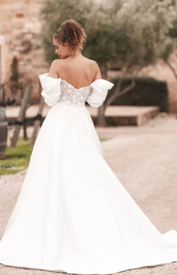 Allure Bridals A1250 ballgown wedding dress with beaded lace appliques, sweetheart bodice, and detachable draped off-shoulder sleeves
