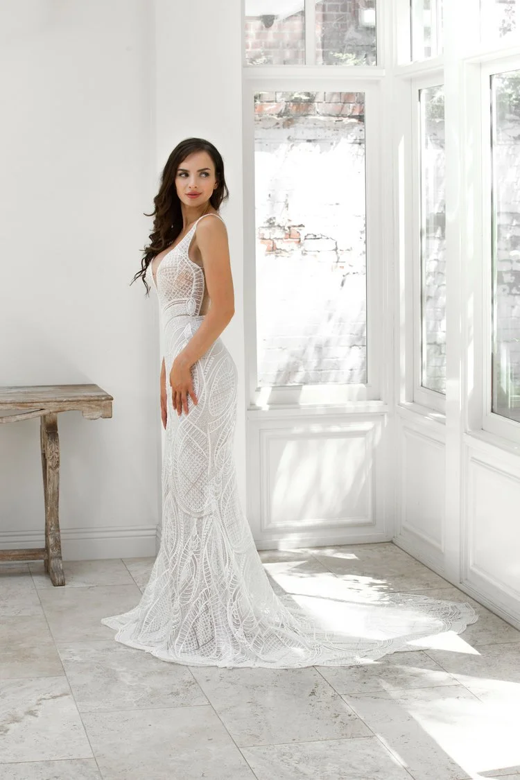 Cizzy ZB215-1Z Zavana Bridal straight skirt wedding dress with plunging V-neckline, laser cut lace, and illusion low back
