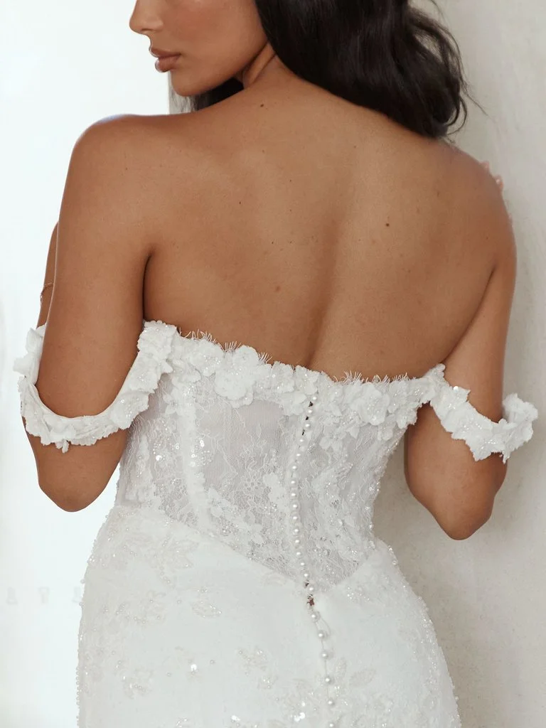Serene Vendela fit-and-flare wedding dress with scoop neckline, 3D floral motifs, sequin lace, and Basque waist