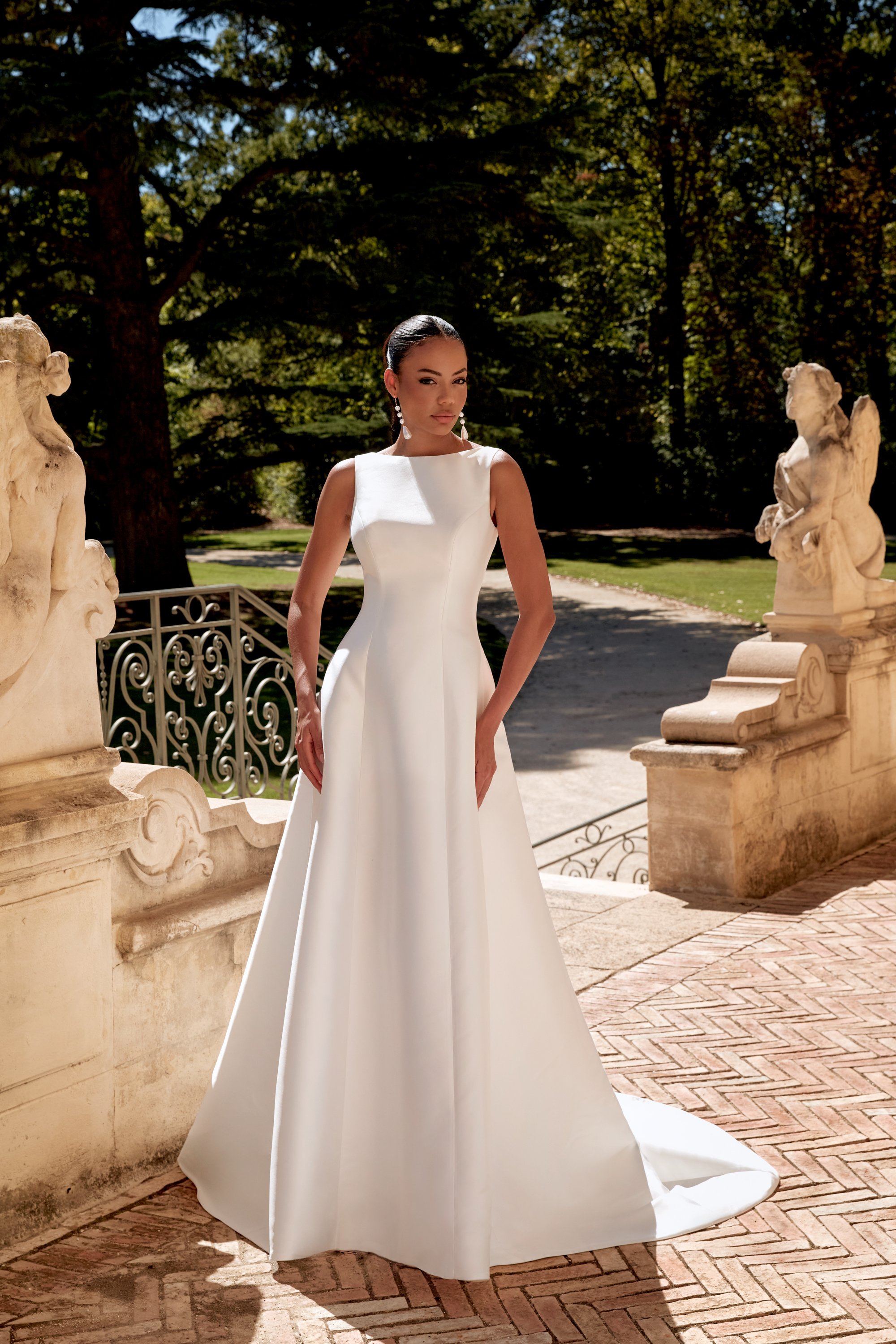 Sincerity 44576 A-line wedding dress with Sabrina neckline, Mikado fabric, and bow back detail
