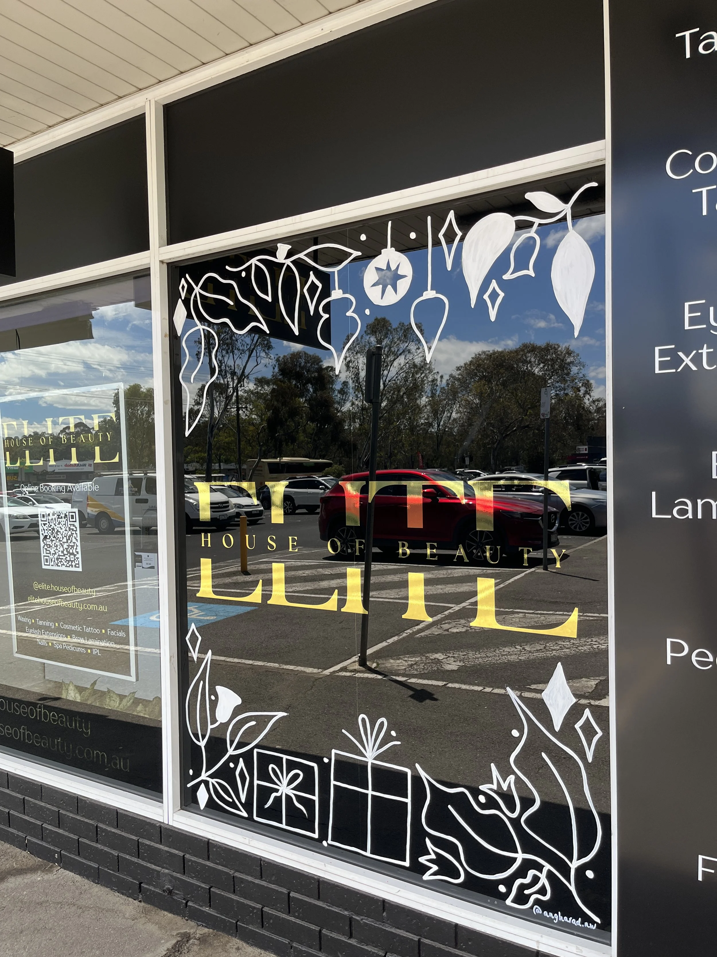 Festive, Christmas Window Painting. Window painting for retail stores Angharad Neal-Williams