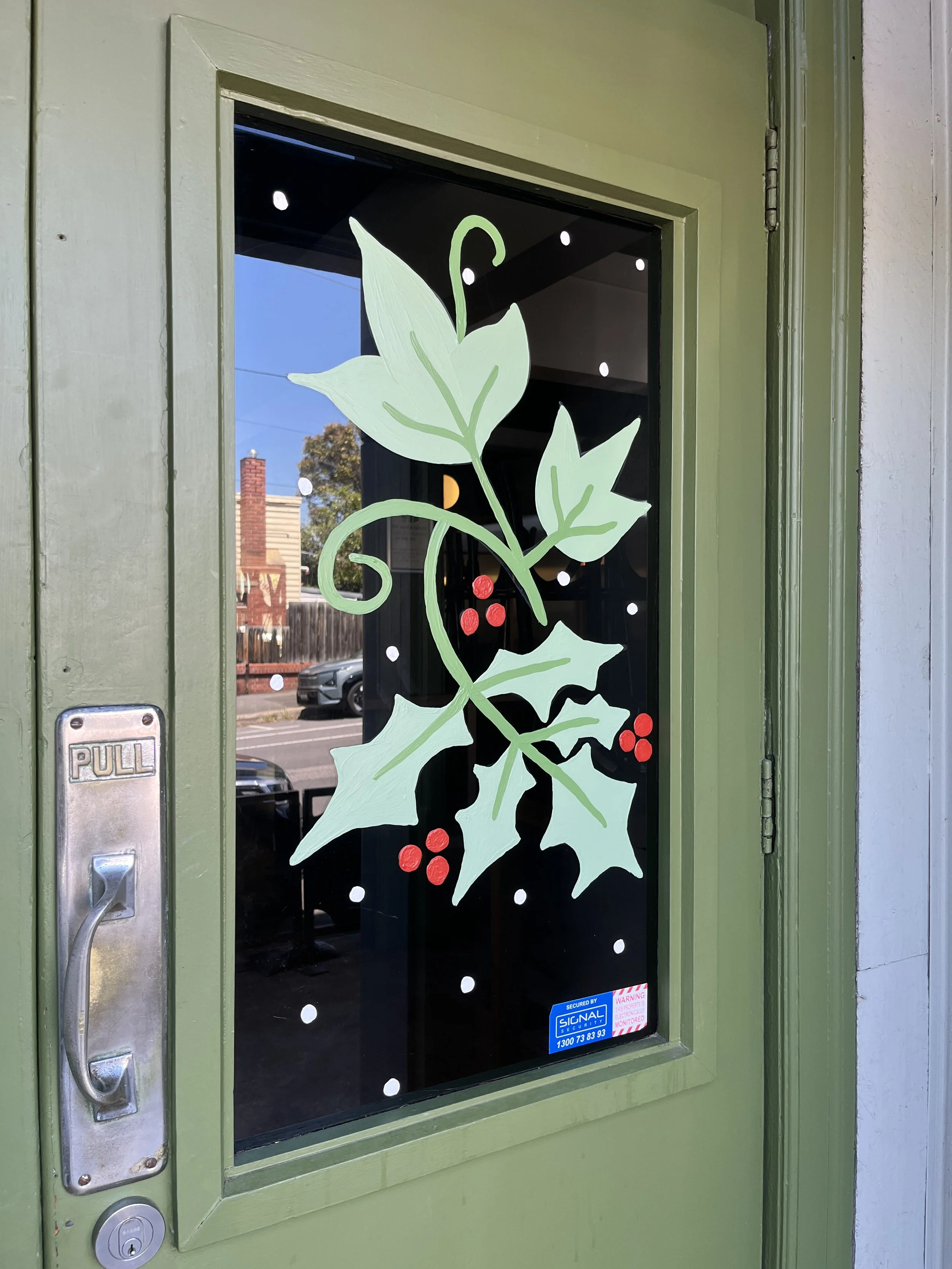 Festive, Christmas Window Painting. Window painting for retail stores Angharad Neal-Williams