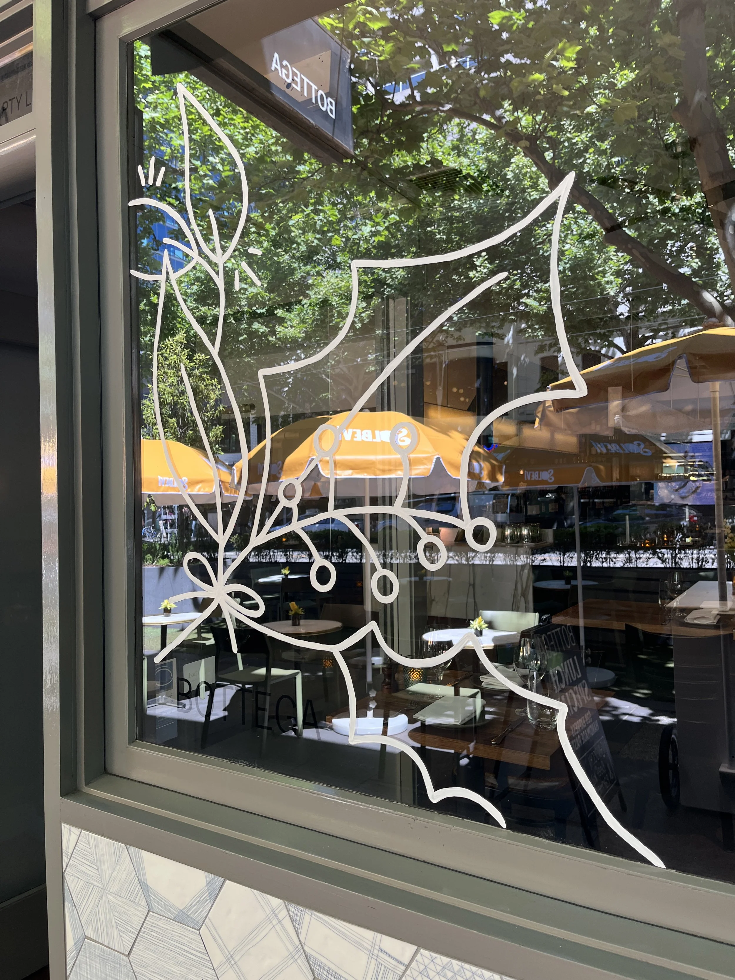 Festive, Christmas Window Painting. Window painting for retail stores Angharad Neal-Williams