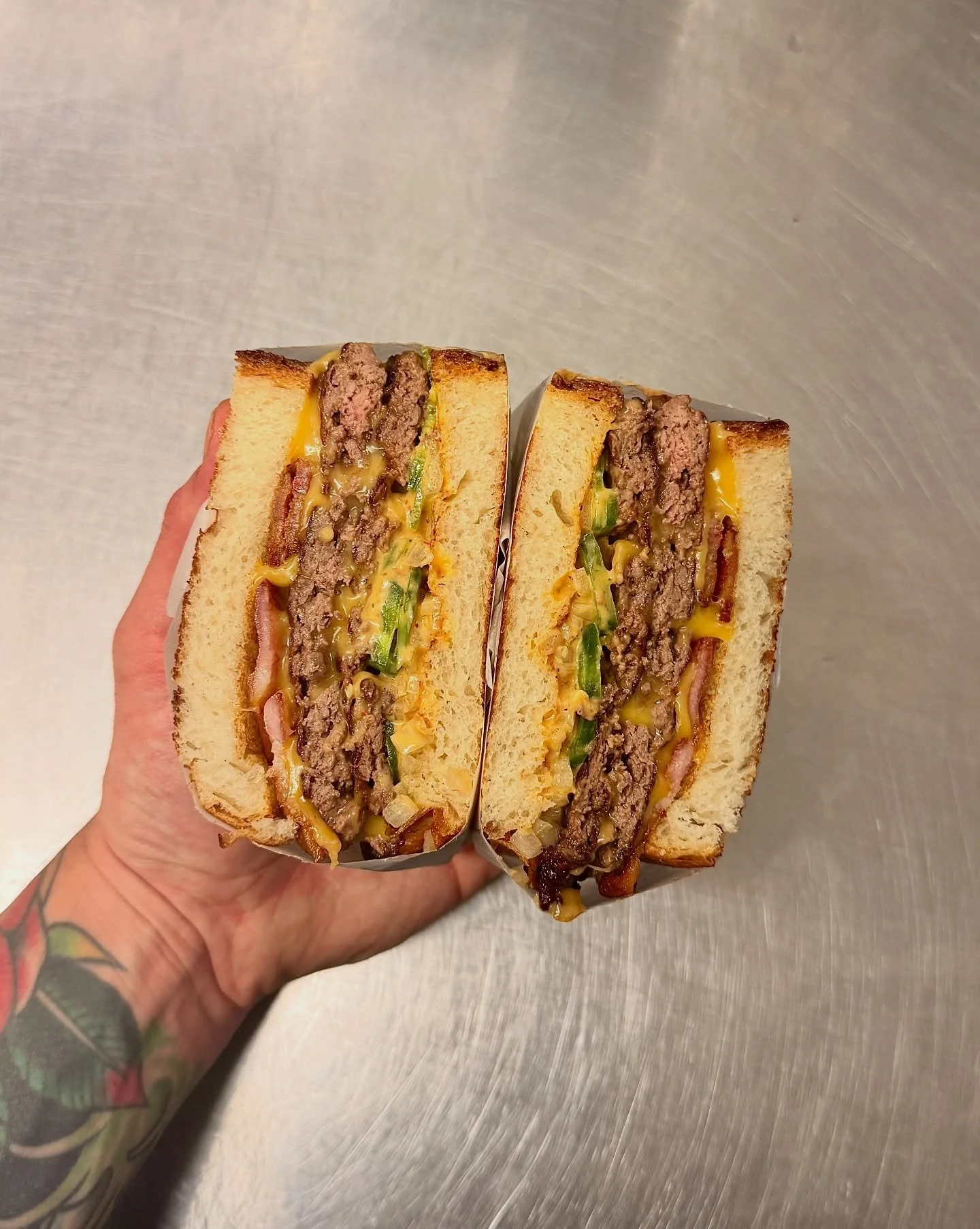 BACON JALAPE&Ntilde;O MELT 🍞🥩🥓🫑🧀 

Quickly becoming our most popular sando

Originally we did this burger in a bun, and it was based on my go to order from five guys. Then one day one of the dough slingers from @gingerinos asked me to do it patt